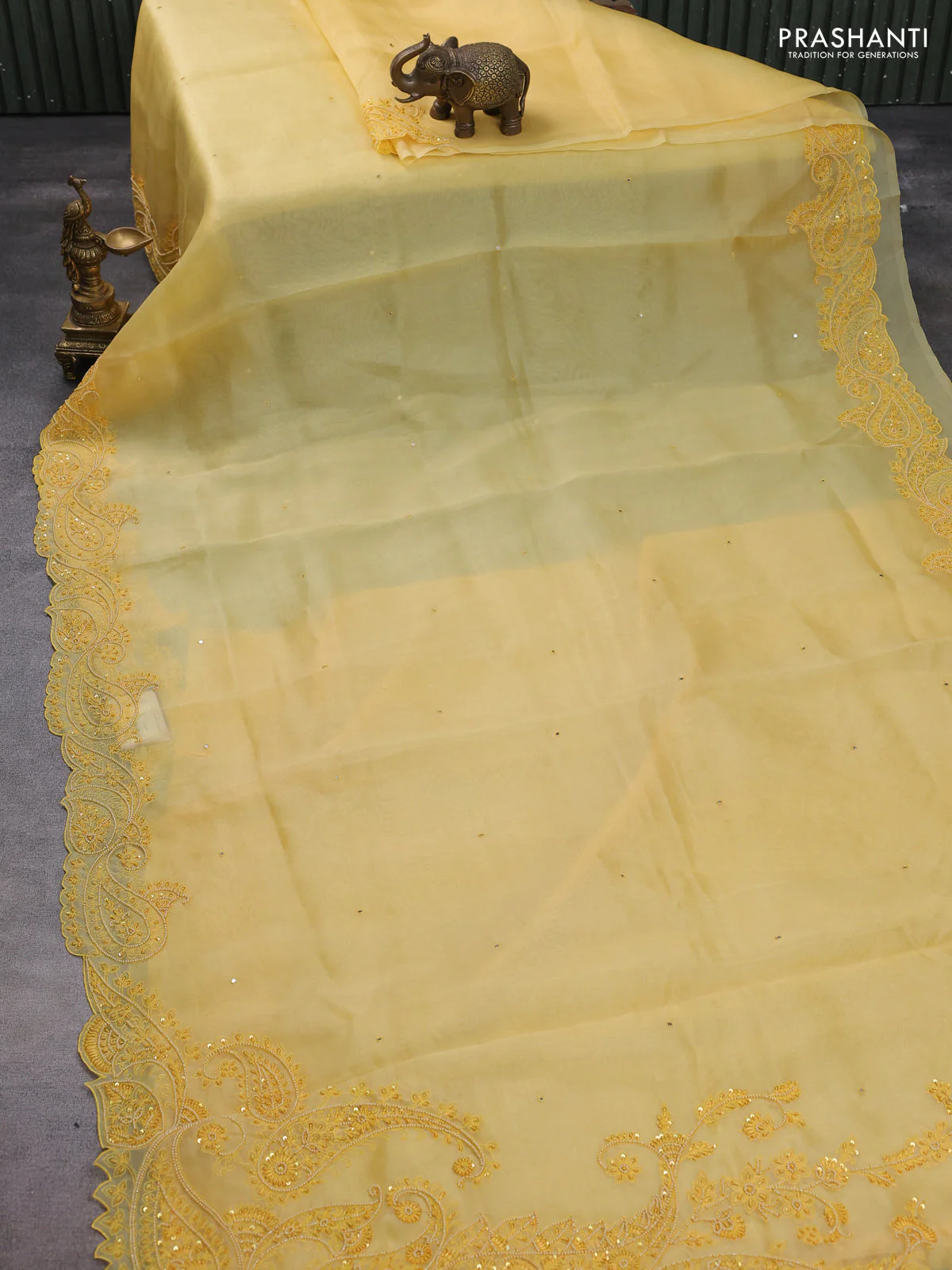 Pure organza silk saree yellow with mirror embroidery buttas and embroidered beaded border - Image 2
