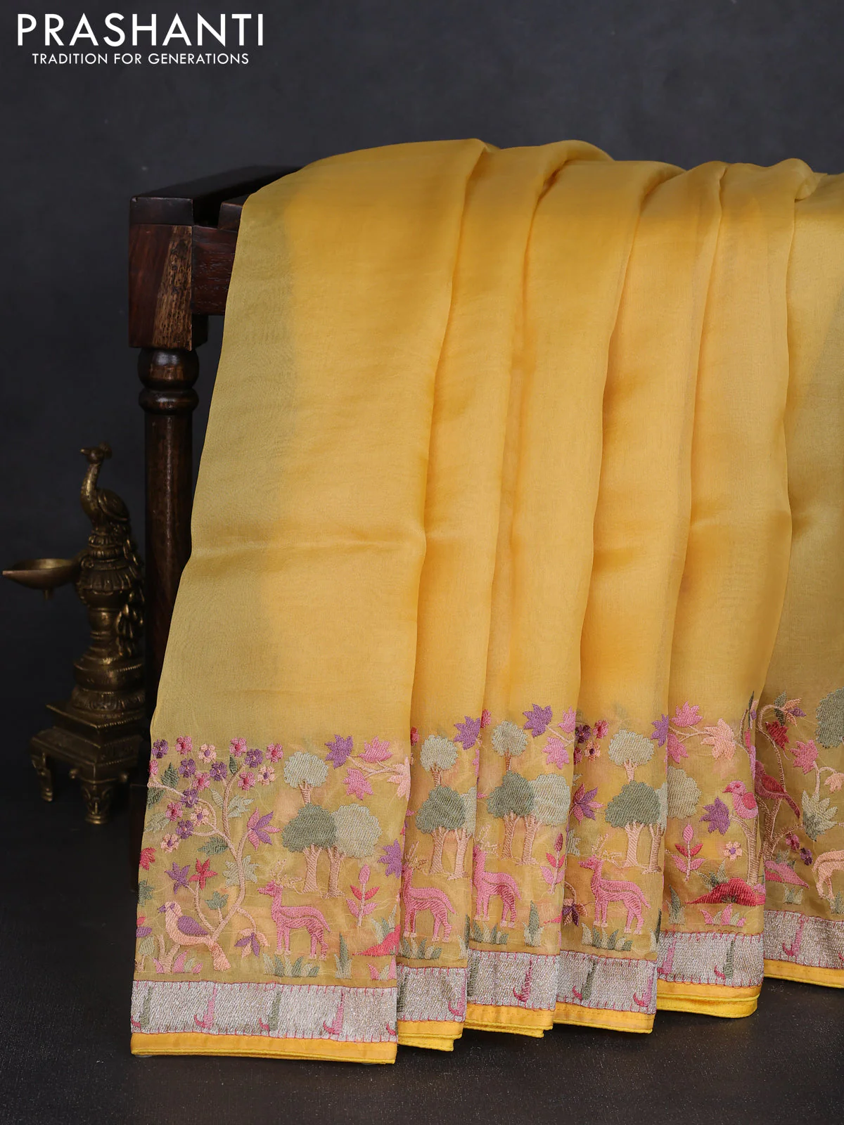 Pure organza silk saree yellow with plain body and embroidery work border