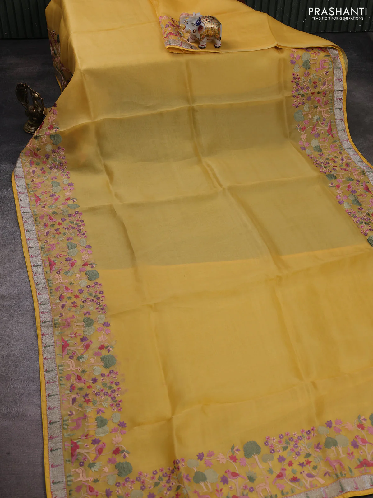 Pure organza silk saree yellow with plain body and embroidery work border - Image 2
