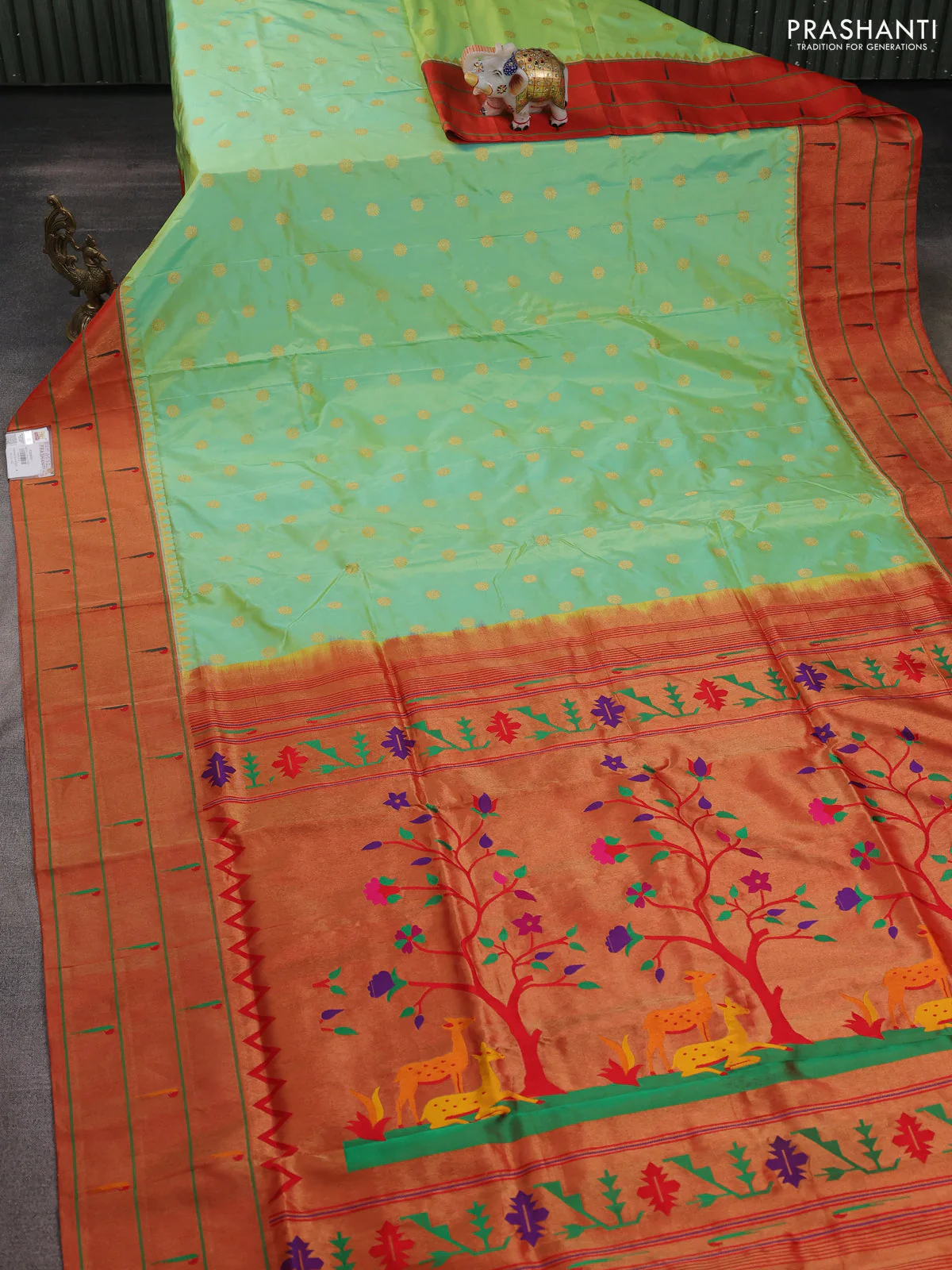 Pure paithani silk saree dual shade of pista green and red with allover zari woven floral buttas and zari woven muniya butta border - Image 2