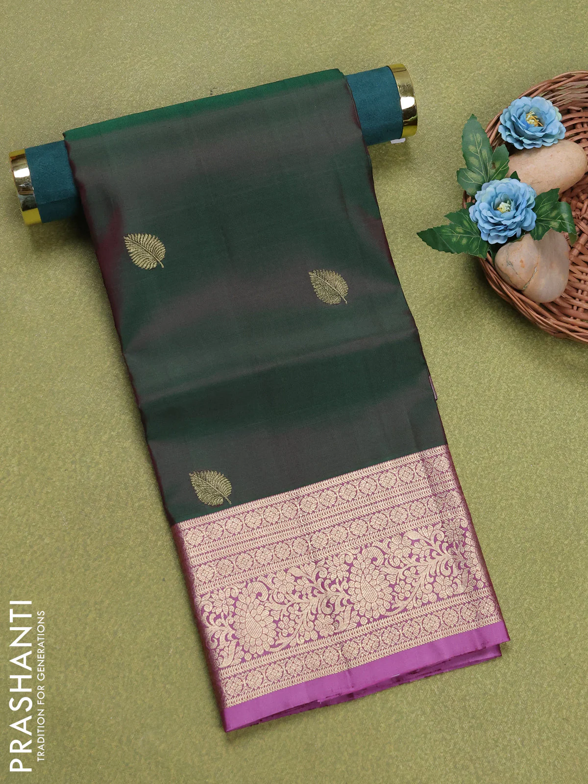 Pure silk unstitched kids lehenga dual shade of bottle green and lotus pink with zari woven buttas and rich zari woven border