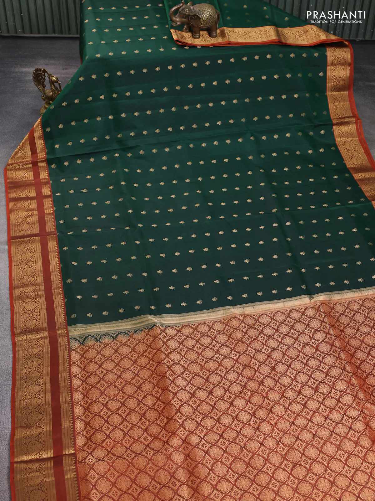 Pure soft silk saree bottle green and rustic orange with allover zari woven buttas and zari woven border - Image 2