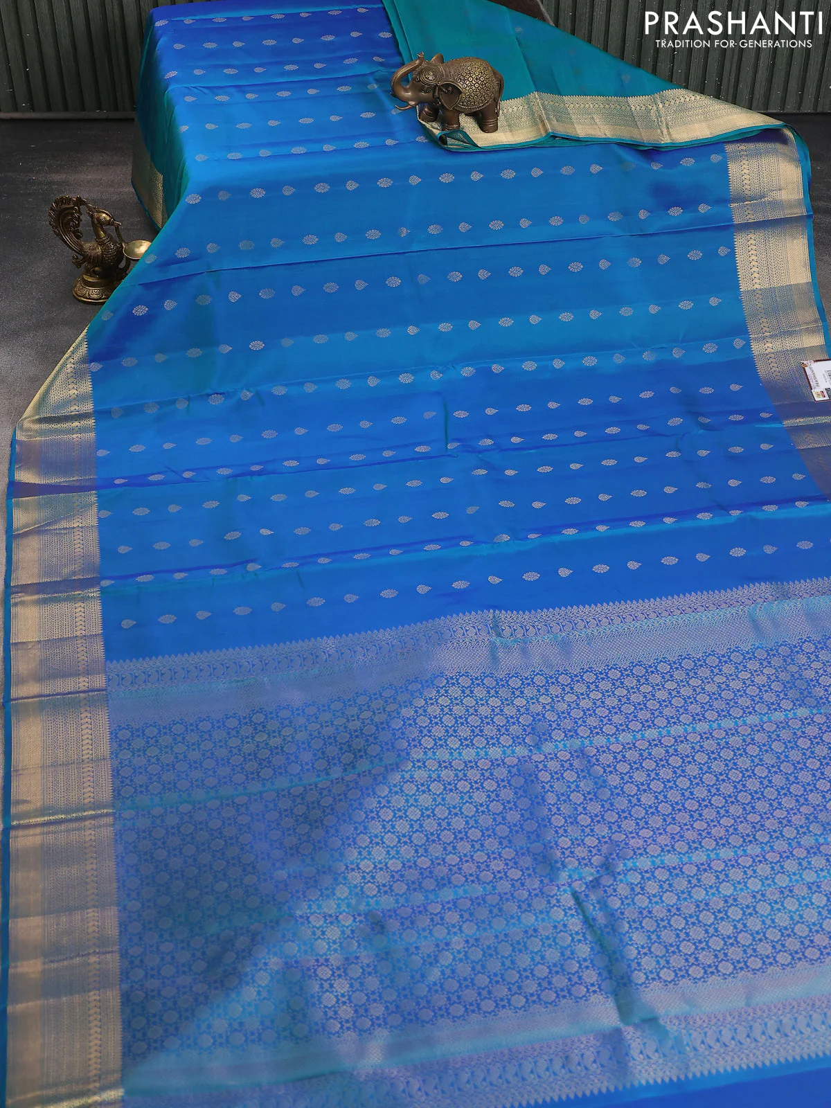 Pure soft silk saree cs blue with allover zari woven buttas and zari woven border - Image 2