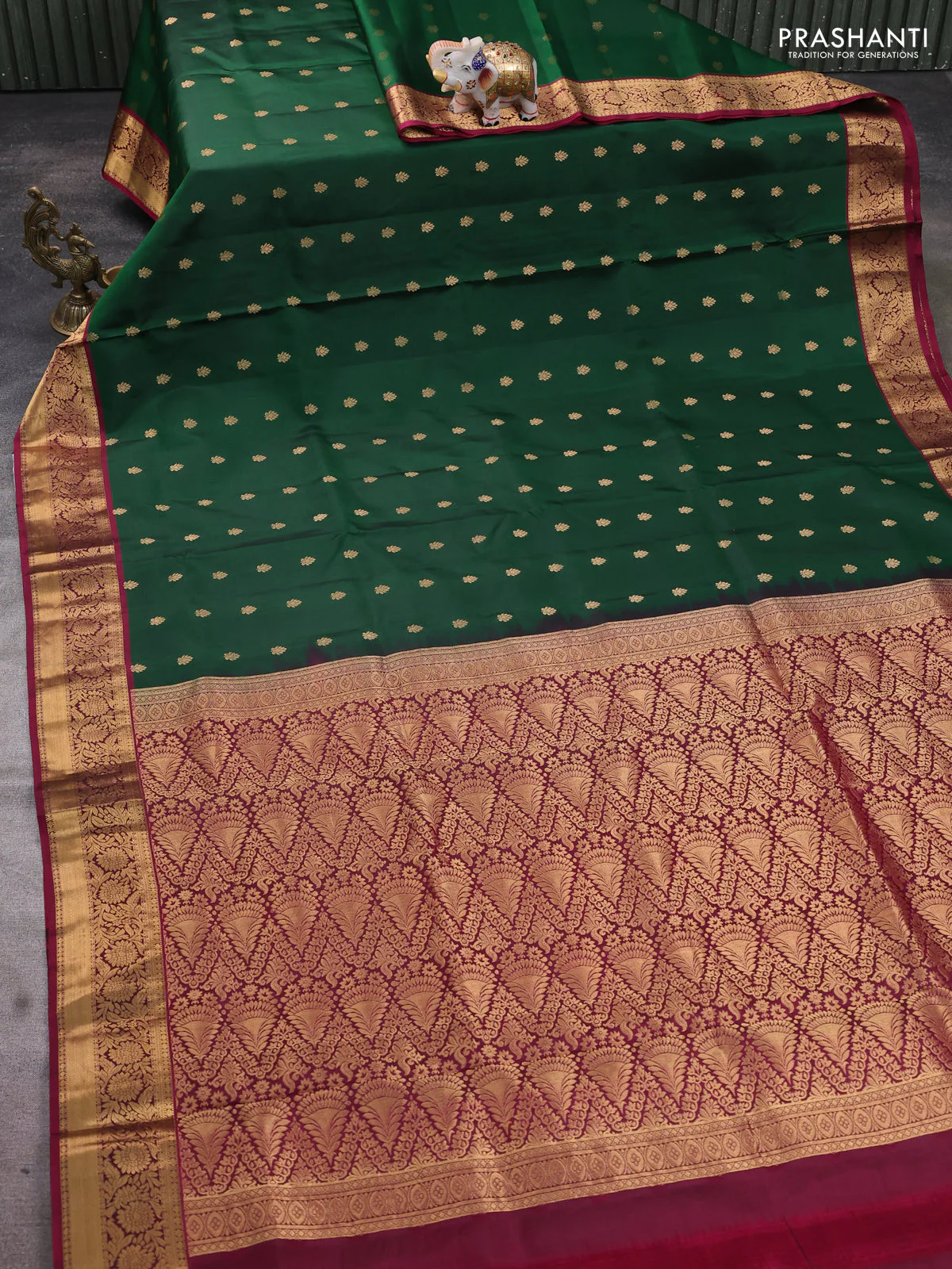 Pure soft silk saree dark green and dark magenta pink with allover zari woven buttas and floral zari woven border - Image 2