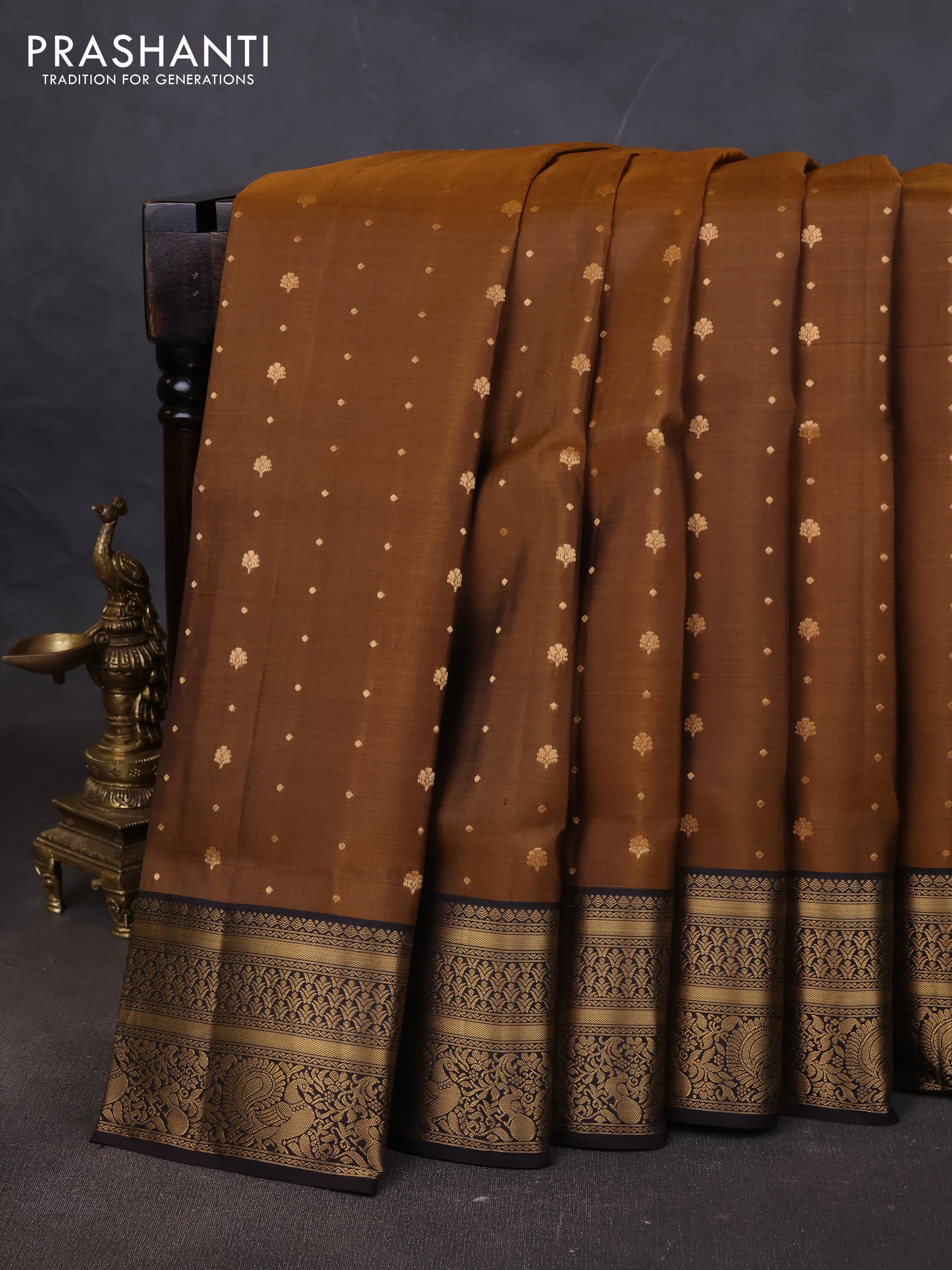 Pure soft silk saree dark mustard and coffee brown with allover zari woven buttas and zari woven annam border
