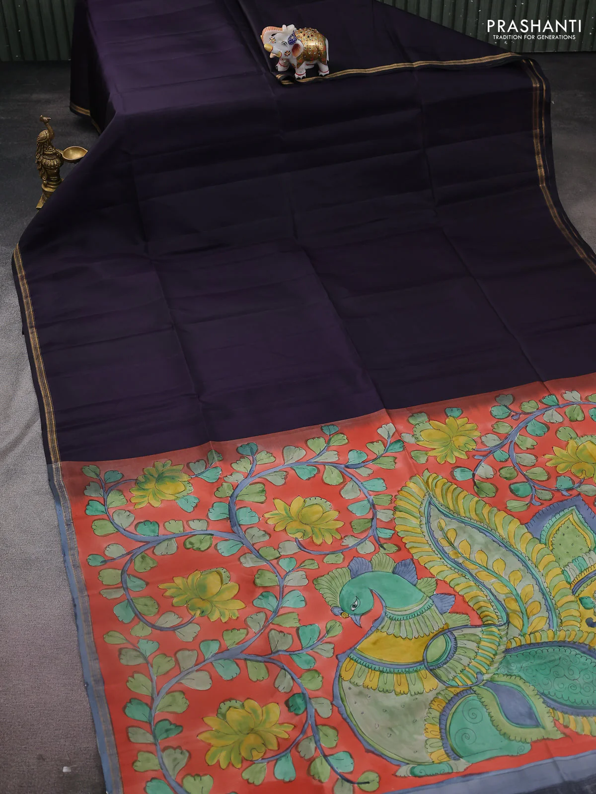 Pure soft silk saree dark navy blue and orange with plain body and kalamkari hand painted pallu