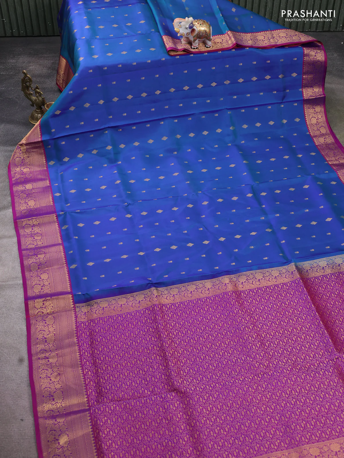 Pure soft silk saree dual shade of bluish green and dual shade of purple with allover zari woven buttas and zari woven floral border - Image 2