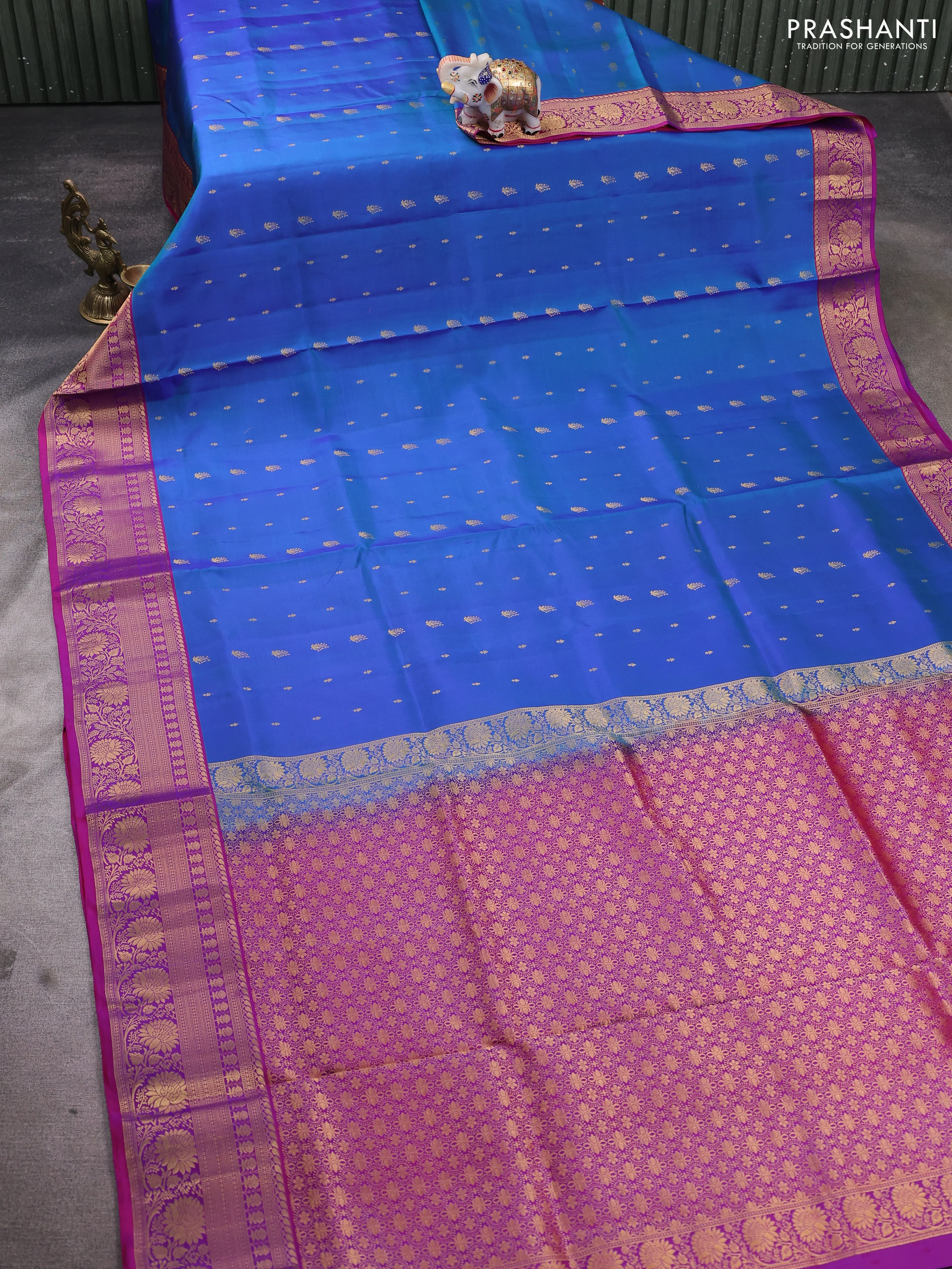 Pure soft silk saree dual shade of cs blue and magenta pink with allover zari woven buttas and rich zari woven border - Image 2