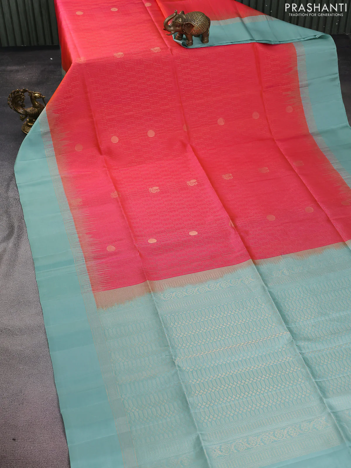 Pure soft silk saree dual shade of pinkish orange and pastel blue with allover zari weaves and zari woven simple border - Image 2