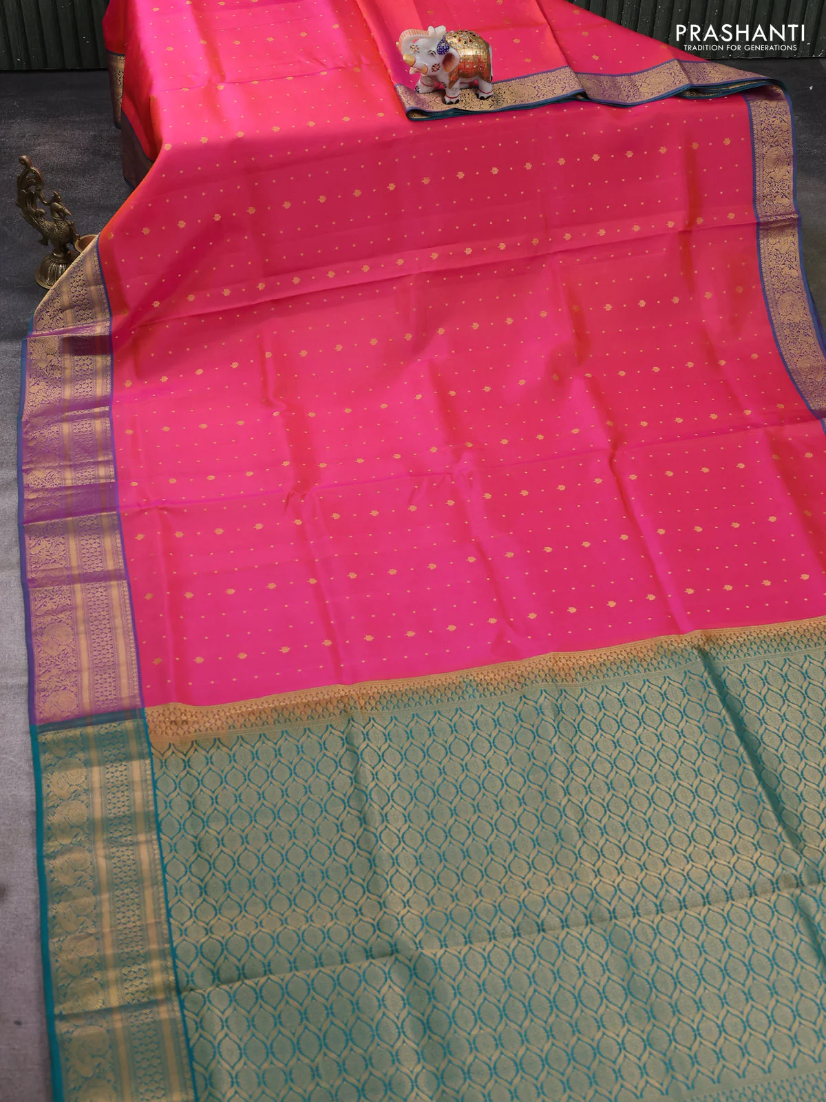 Pure soft silk saree dual shade of pinkish orange and teal green with allover zari woven buttas and zari woven annam border - Image 2