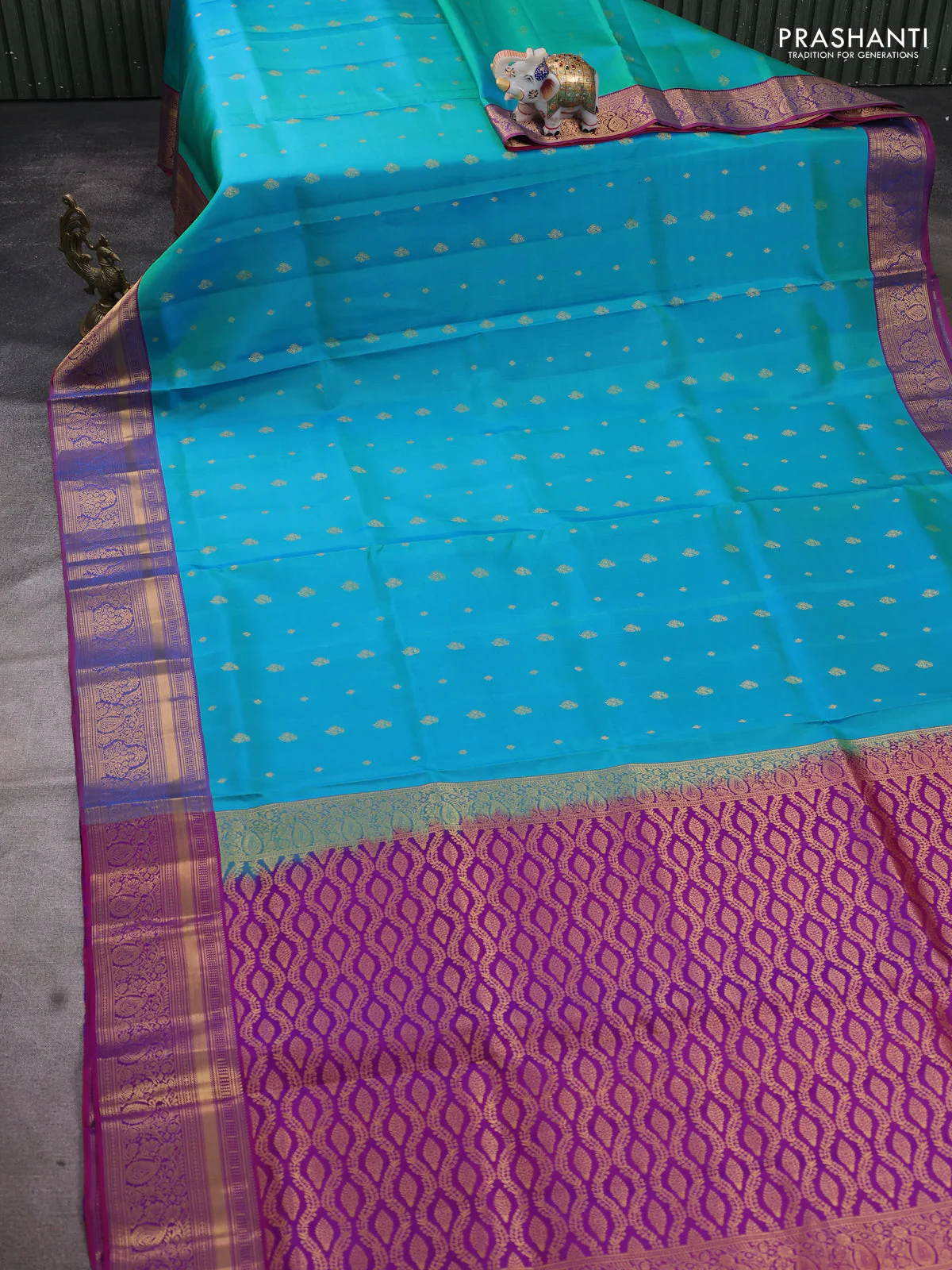 Pure soft silk saree dual shade of teal bluish green and purple with allover zari woven buttas and rich zari woven border - Image 2