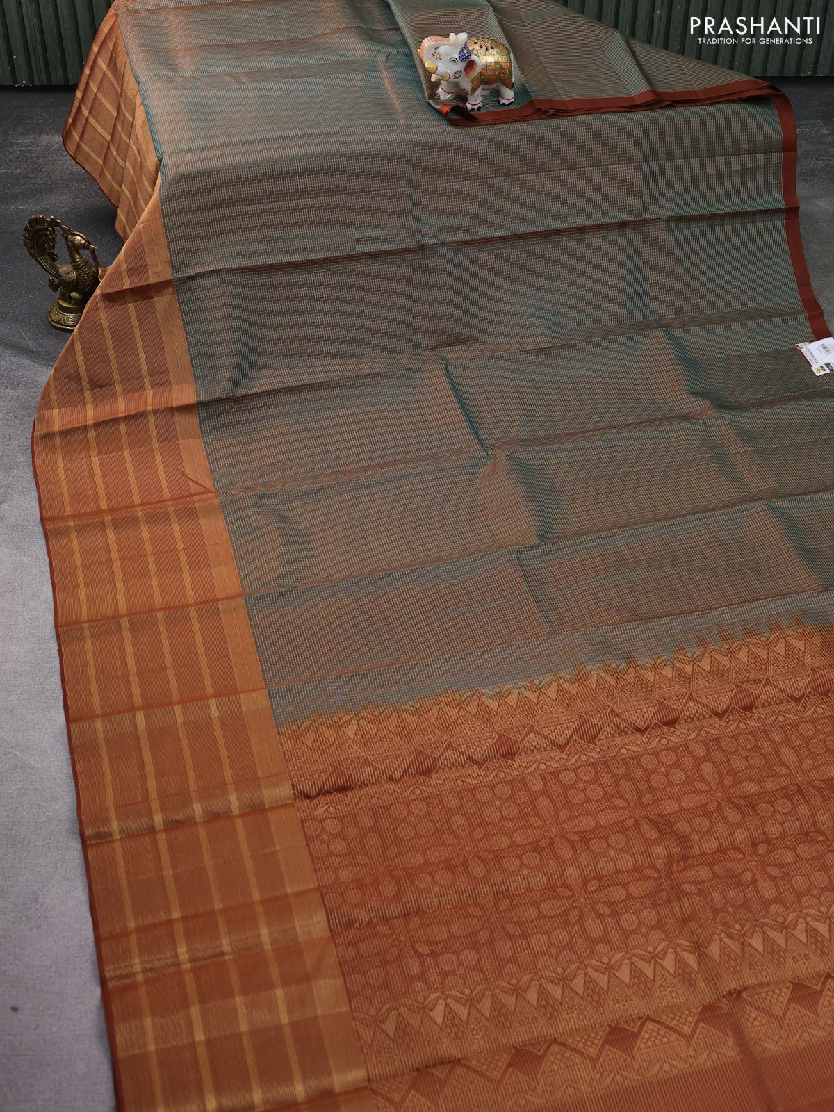 Pure soft silk saree dual shade of teal green and brown with allover small zari checked pattern and long zari woven border - Image 2