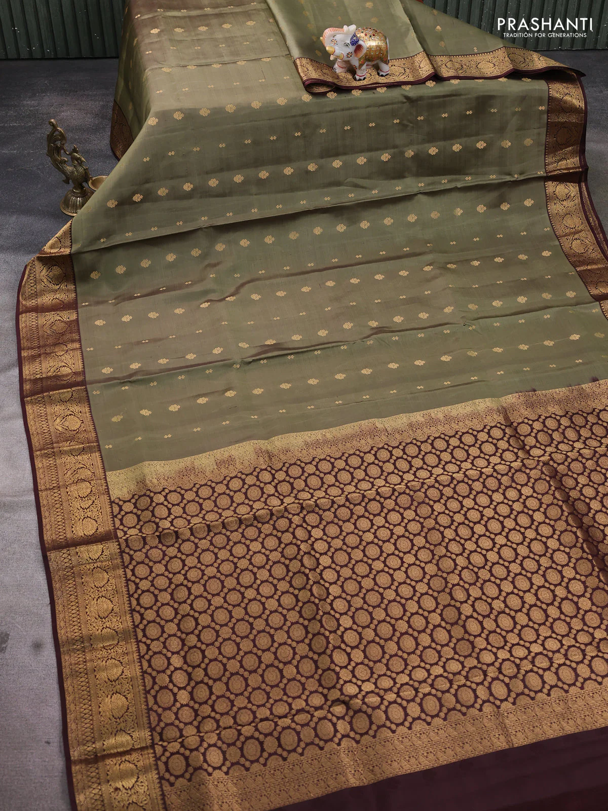 Pure soft silk saree elaichi green and coffee brown with allover zari woven buttas and rich zari woven border - Image 2