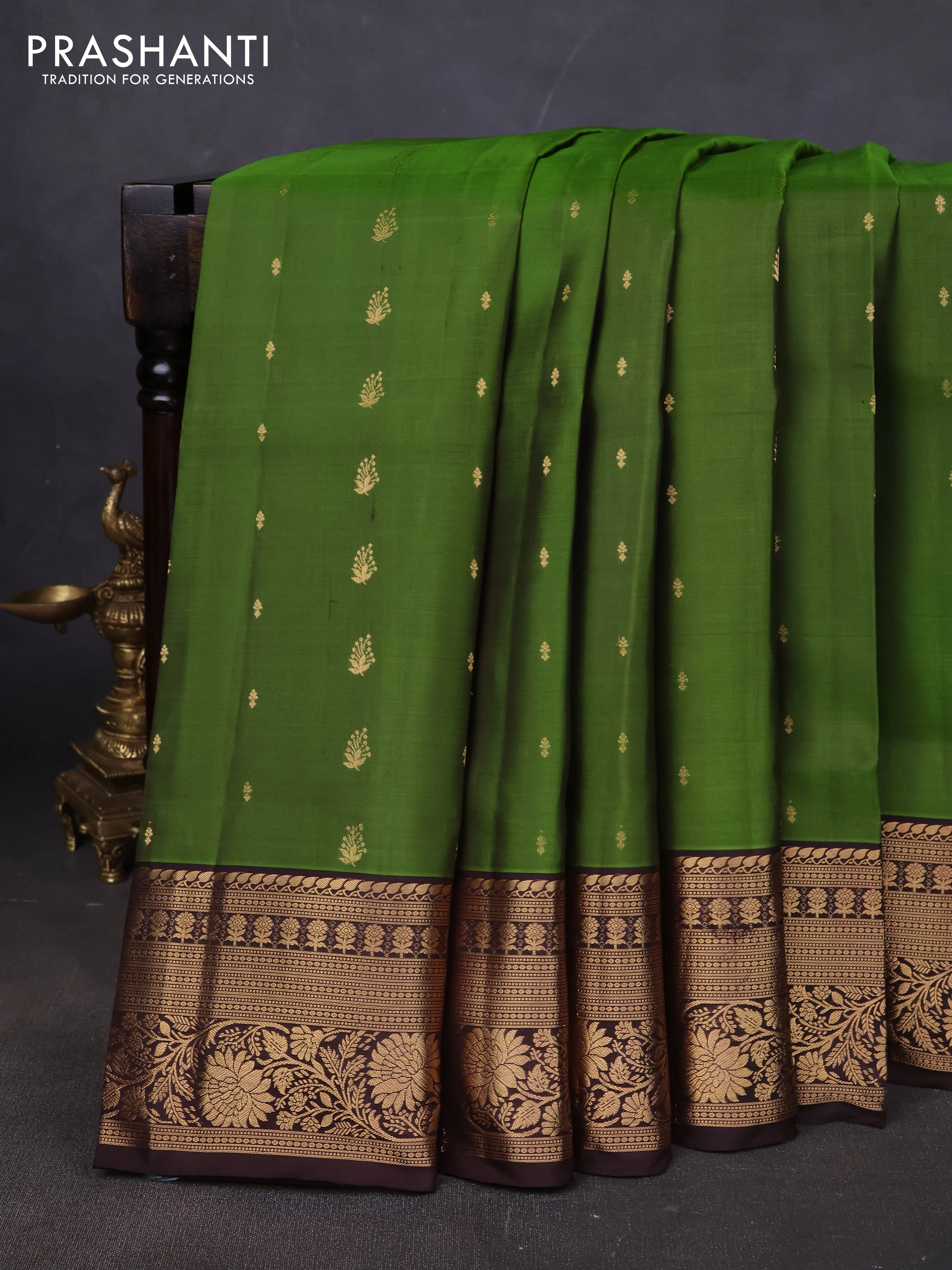 Pure soft silk saree green and coffee brown with allover zari woven buttas and rich zari woven border
