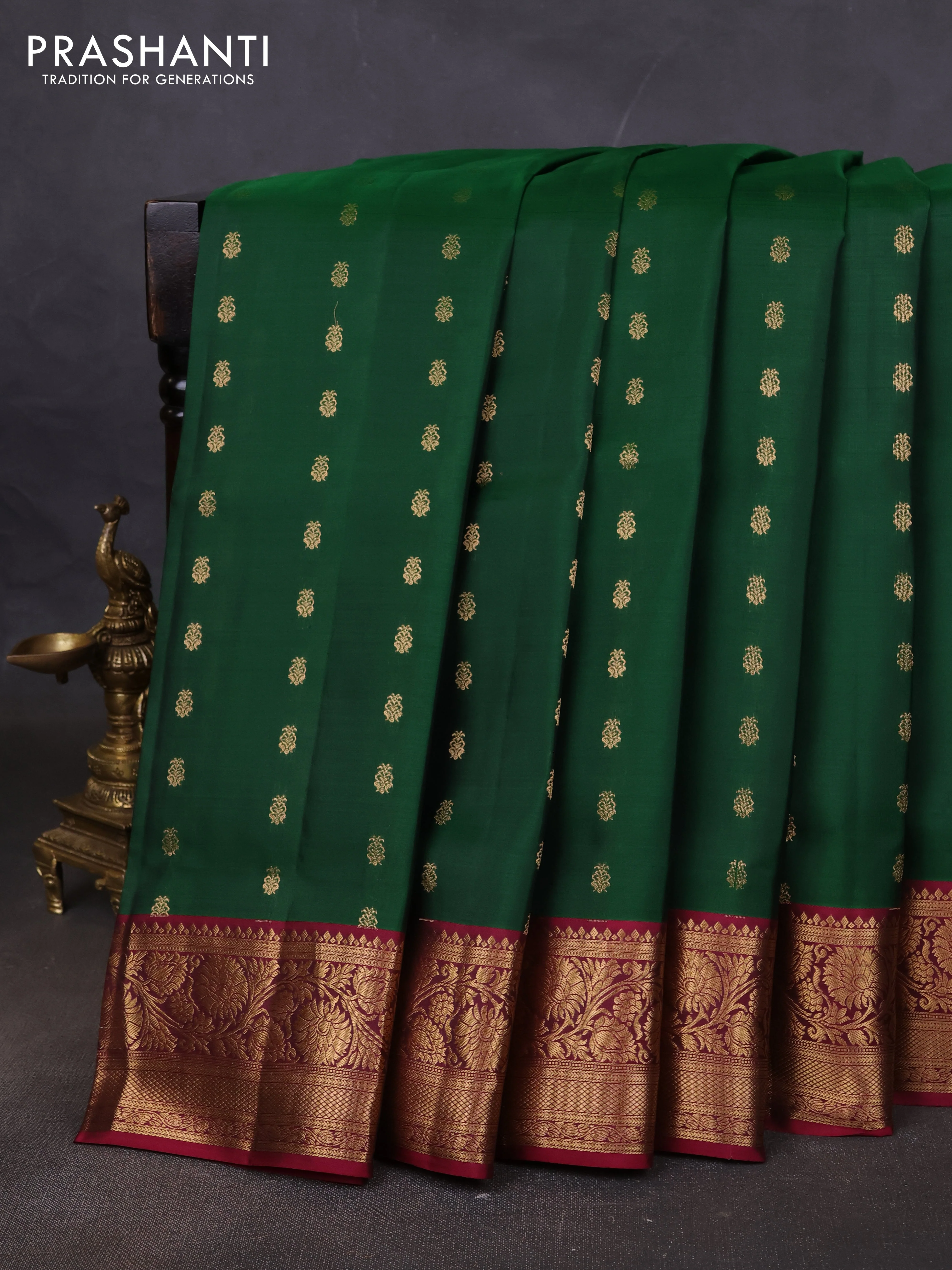 Pure soft silk saree green and maroon with allover zari woven buttas and floral zari woven border