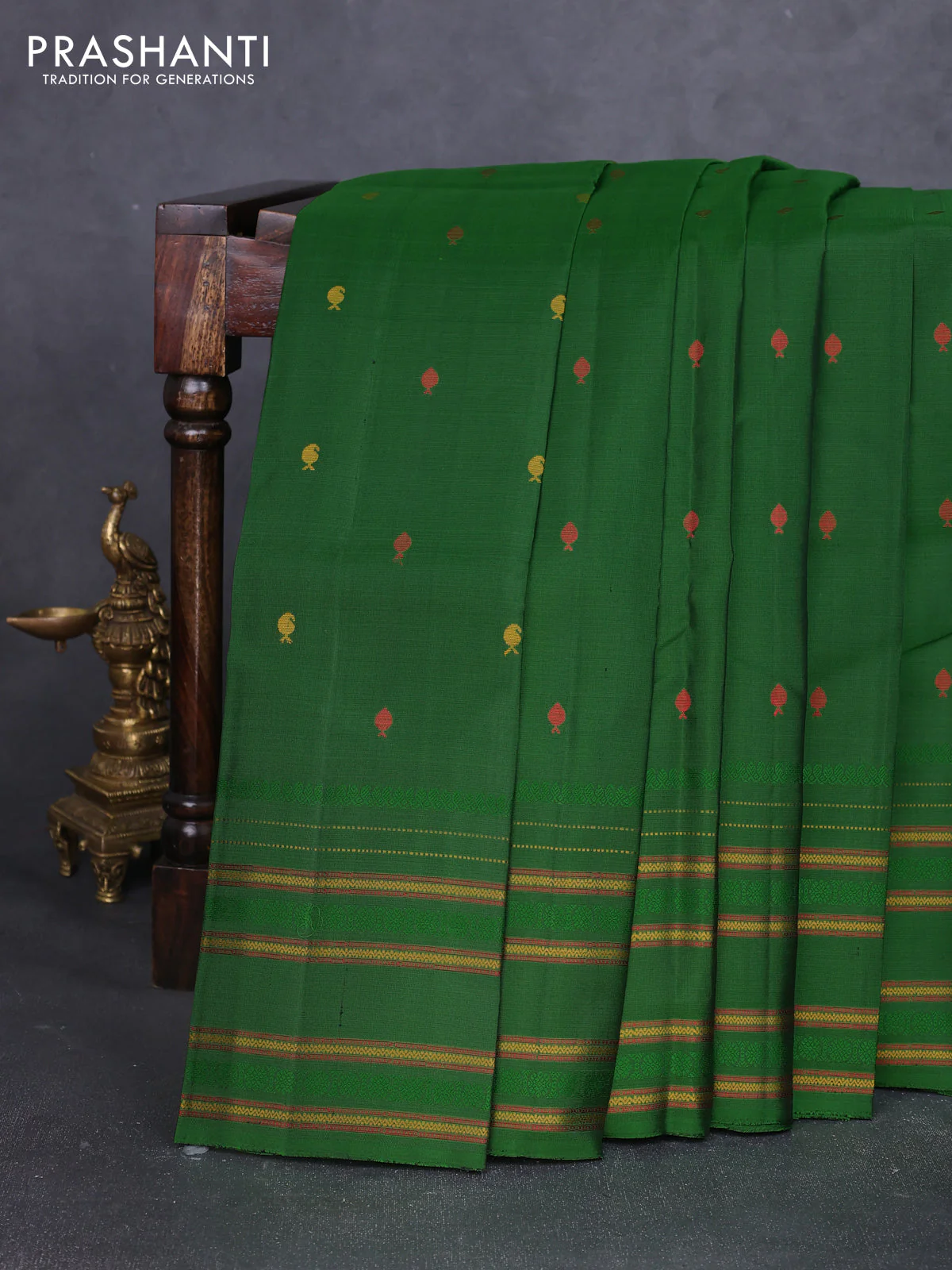 Pure soft silk saree green with allover thread woven buttas and rettapet thread woven border