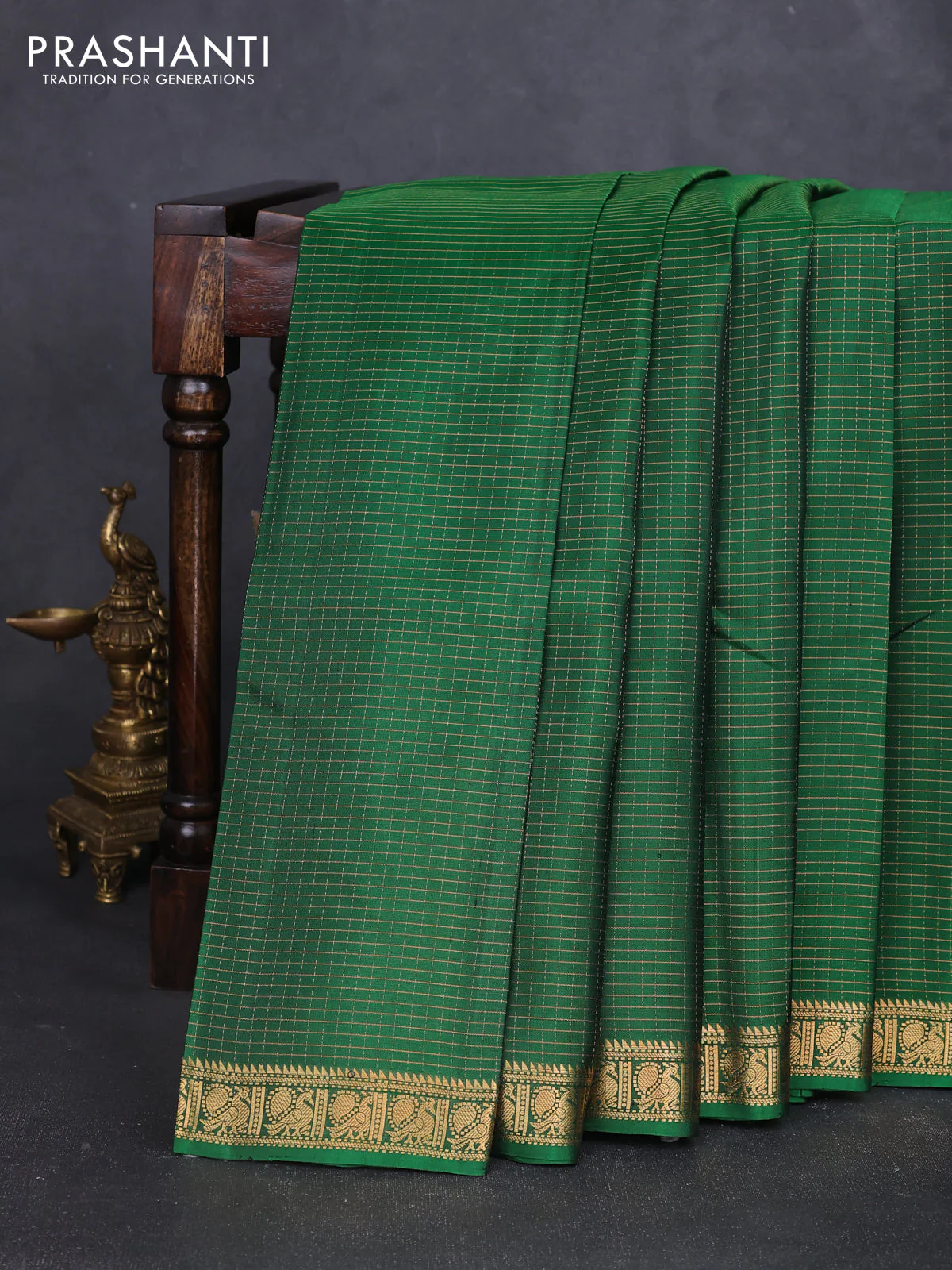 Pure soft silk saree green with allover zari checks pattern and zari woven border