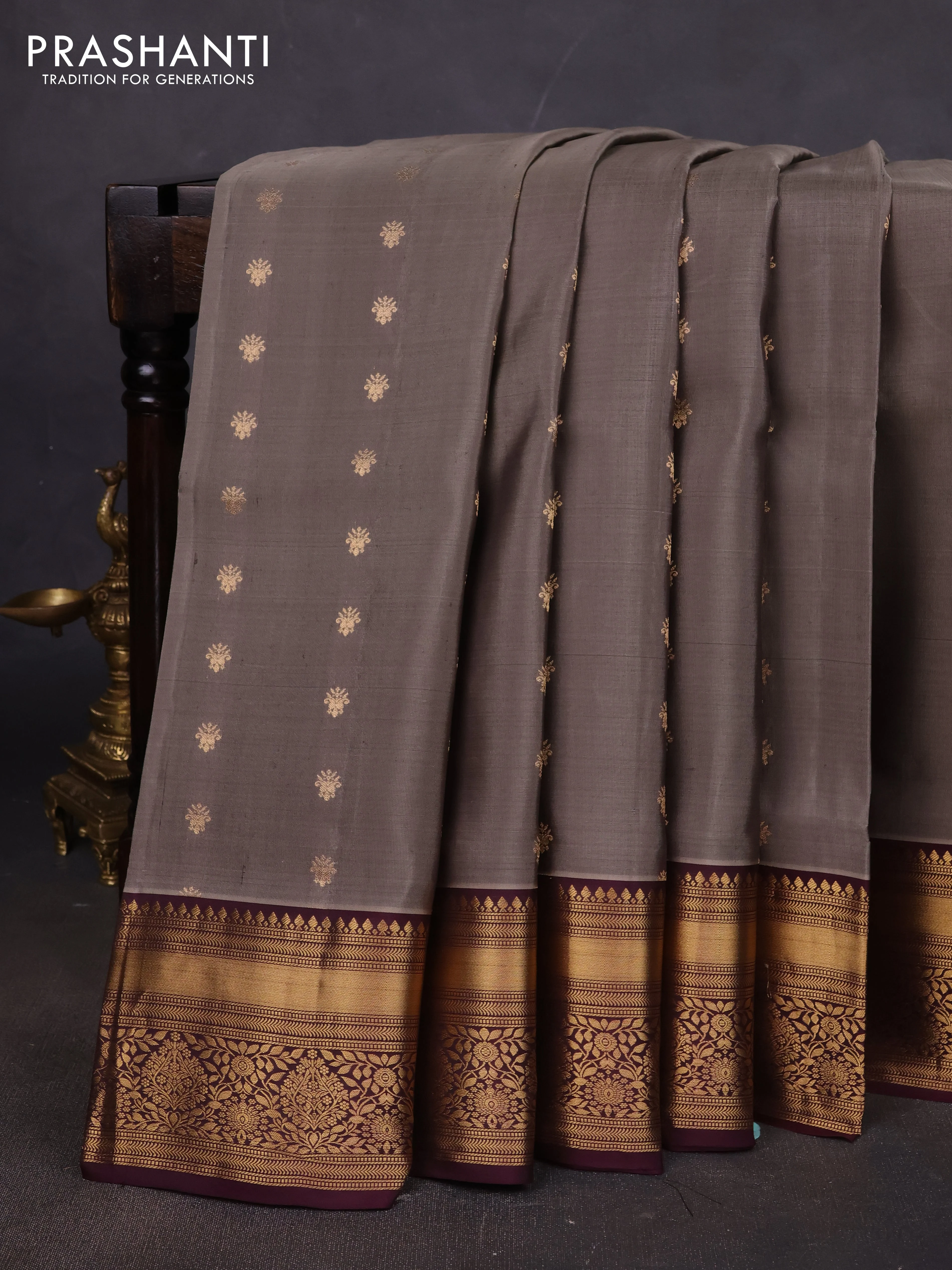 Pure soft silk saree grey shade and wine shade with allover zari woven buttas and floral zari woven border