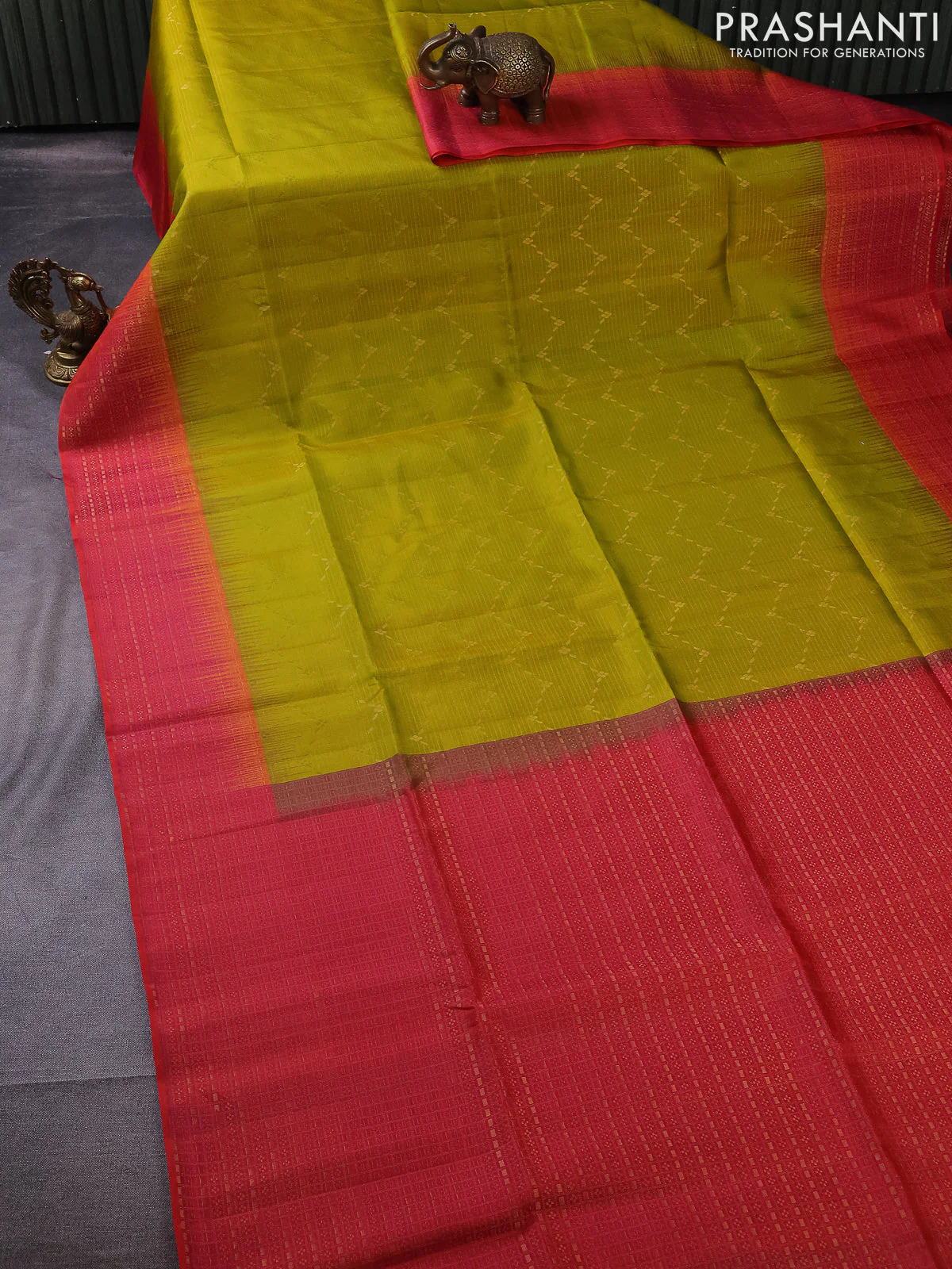 Pure soft silk saree lime green and dual shade of pinkish orange with allover zari woven brocade weaves and zari woven border - Image 2