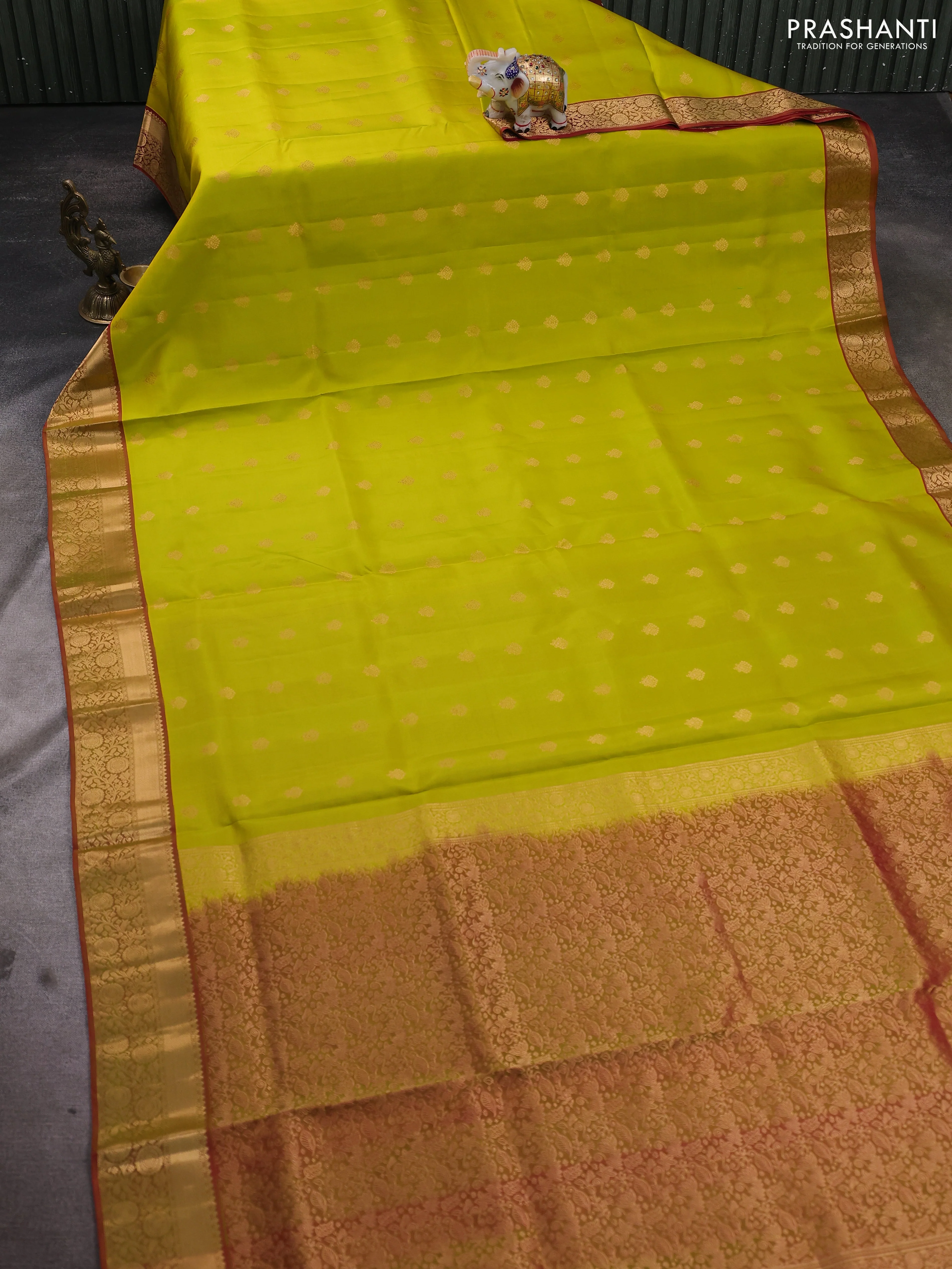 Pure soft silk saree lime yellow and dual shade of pinkish green with allover zari woven buttas and zari woven floral border - Image 2