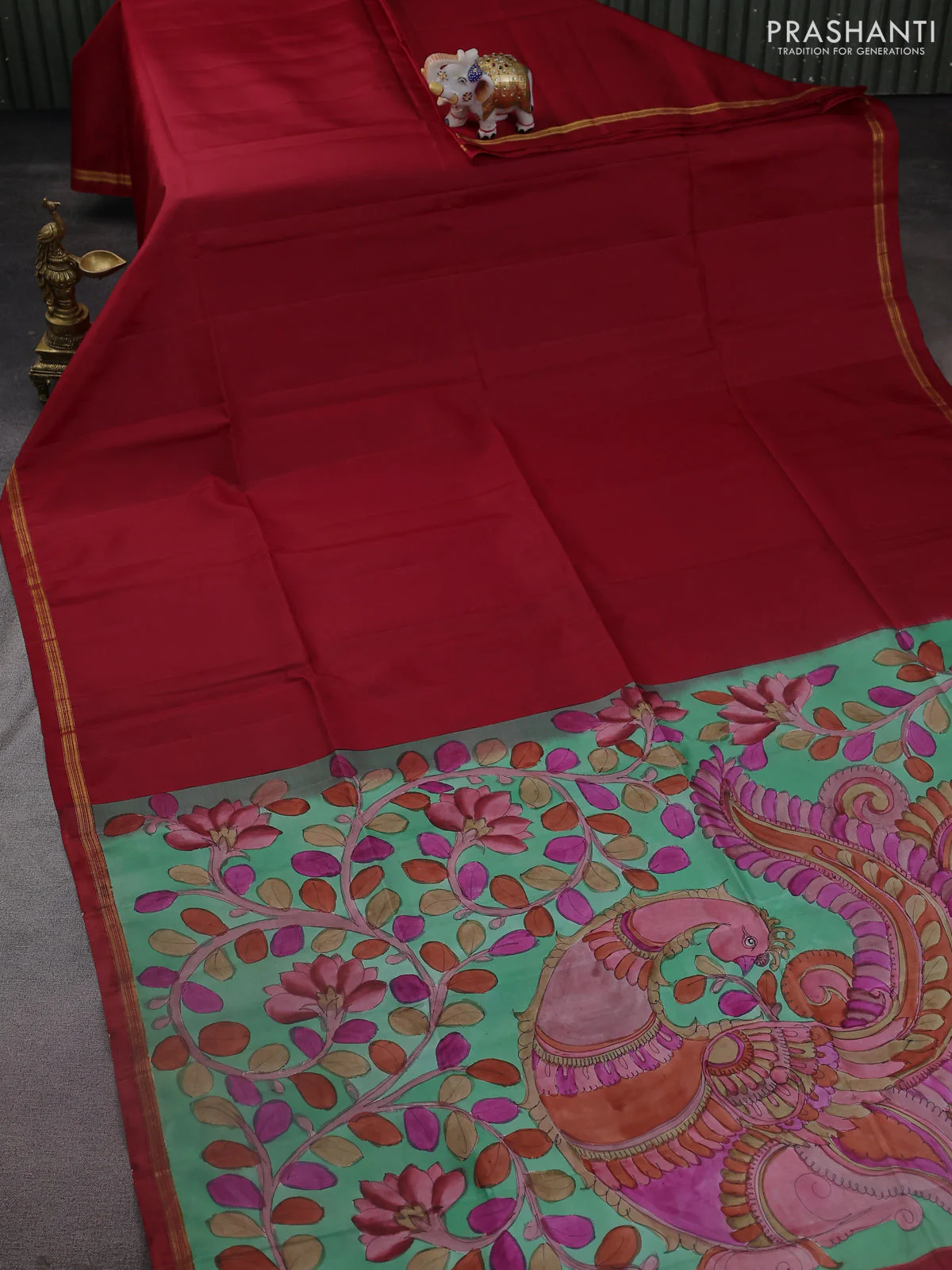 Pure soft silk saree maroon and pastel green with plain body and kalamkari hand painted pallu