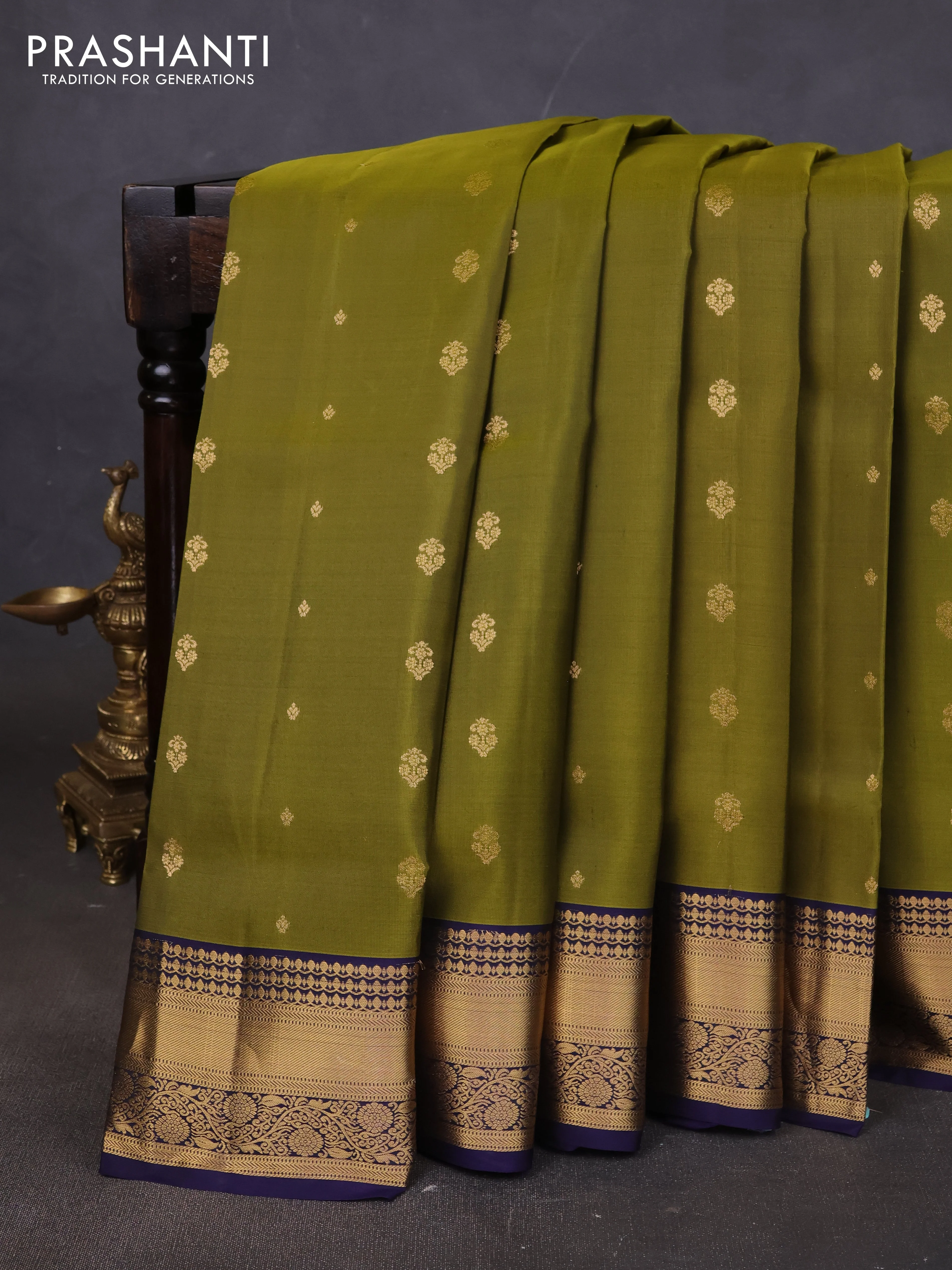Pure soft silk saree mehendi green and navy blue with allover zari woven buttas and rich zari woven border