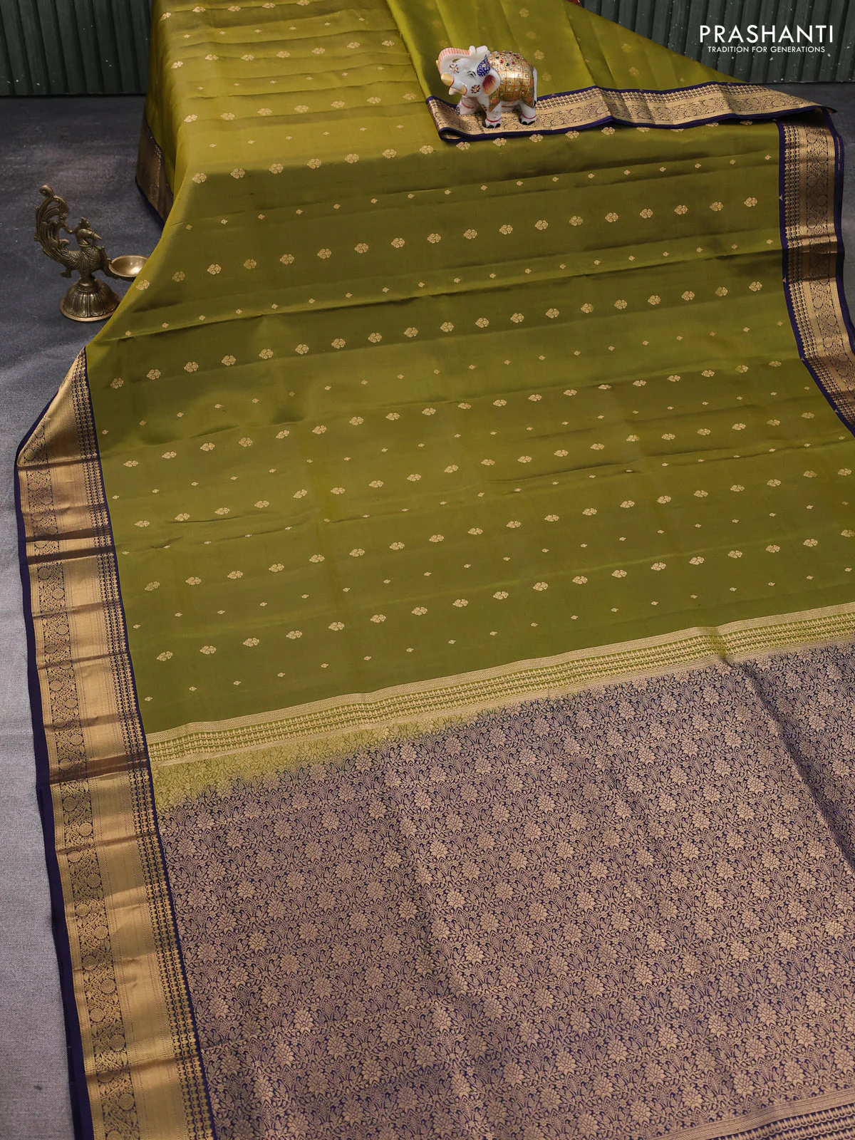 Pure soft silk saree mehendi green and navy blue with allover zari woven buttas and rich zari woven border - Image 2