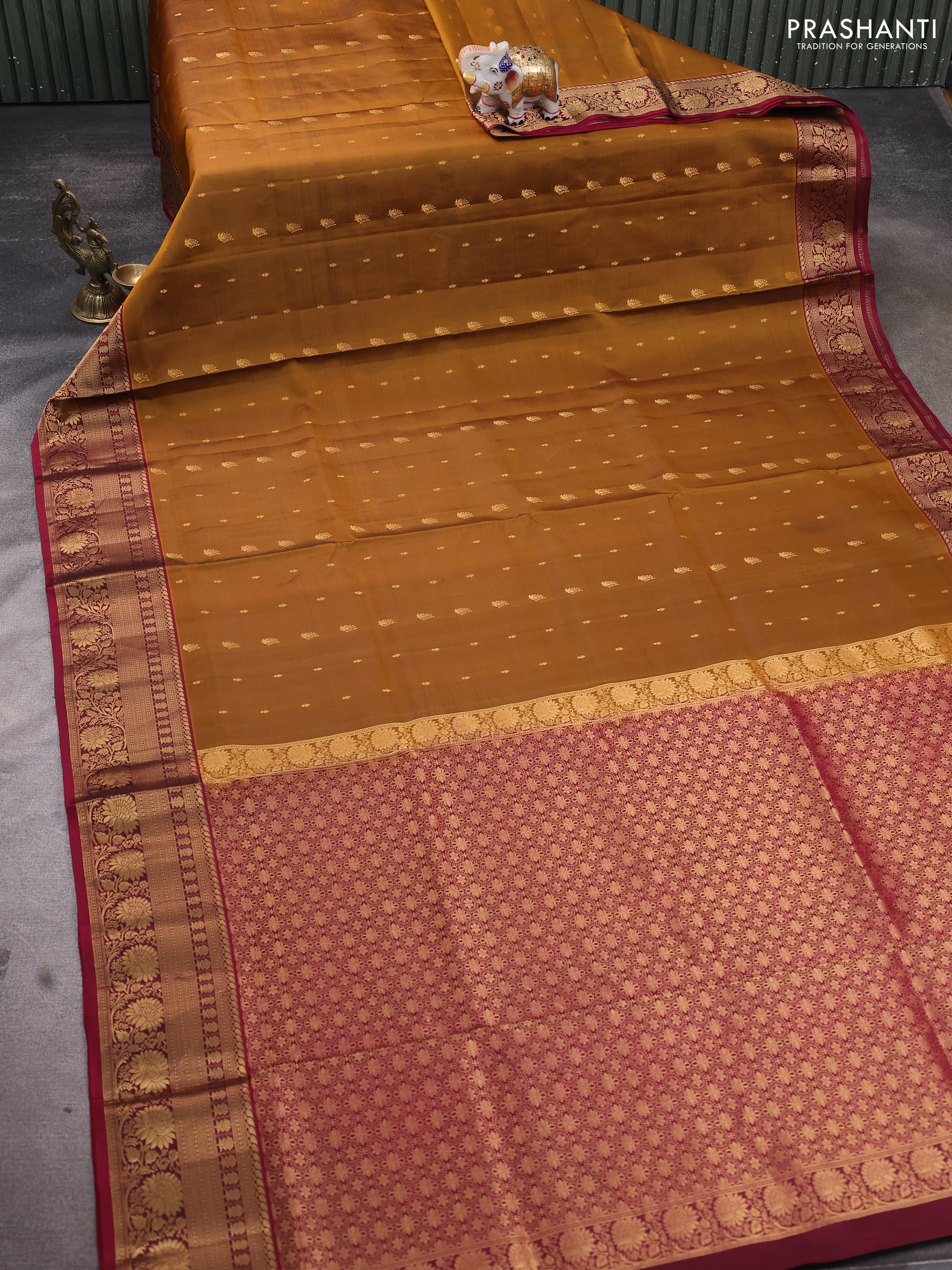Pure soft silk saree mustard shade and maroon with allover zari woven buttas and rich zari woven border - Image 2