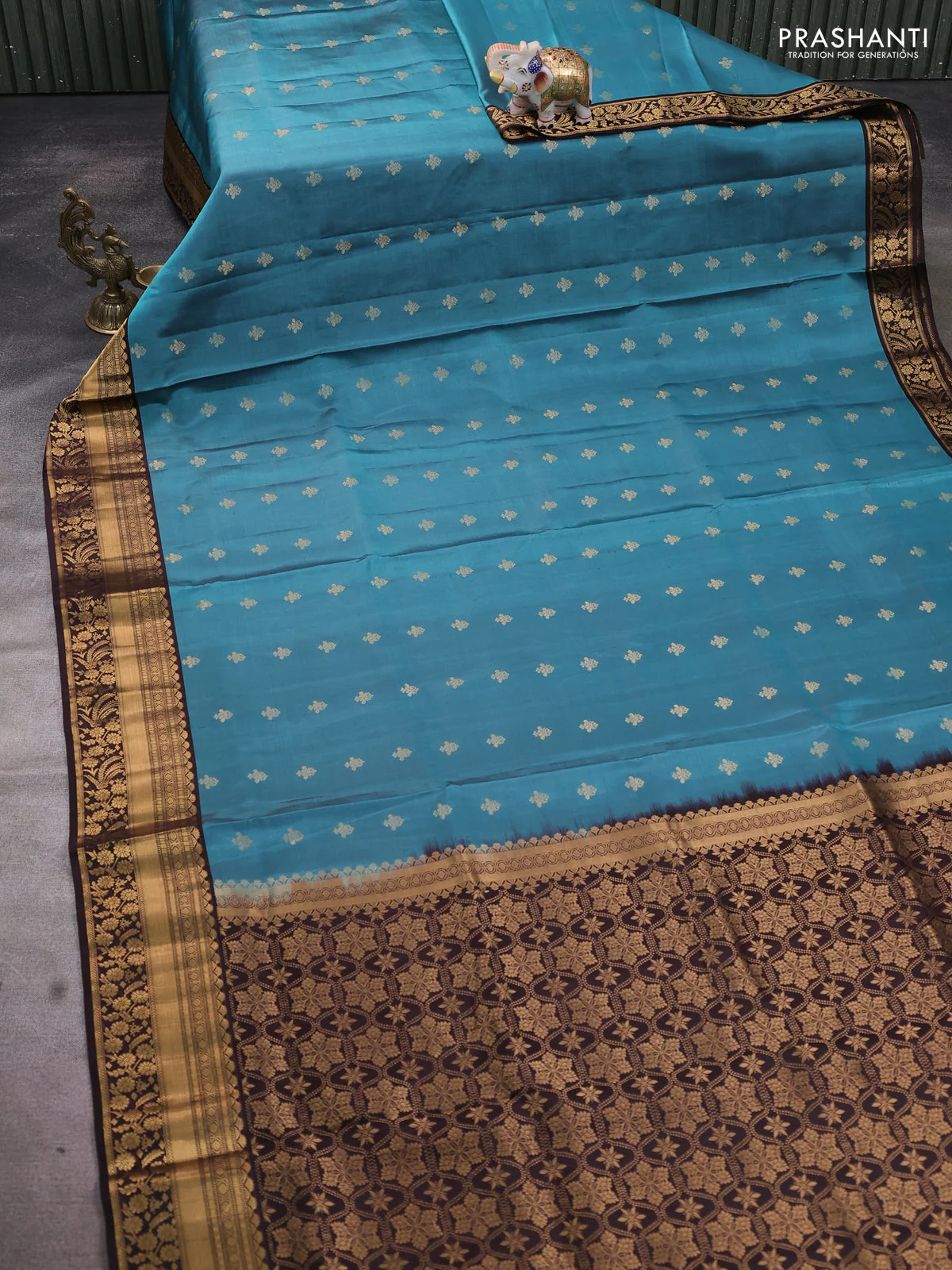 Pure soft silk saree pastel blue and coffee brown with allover zari woven buttas and zari woven border - Image 2
