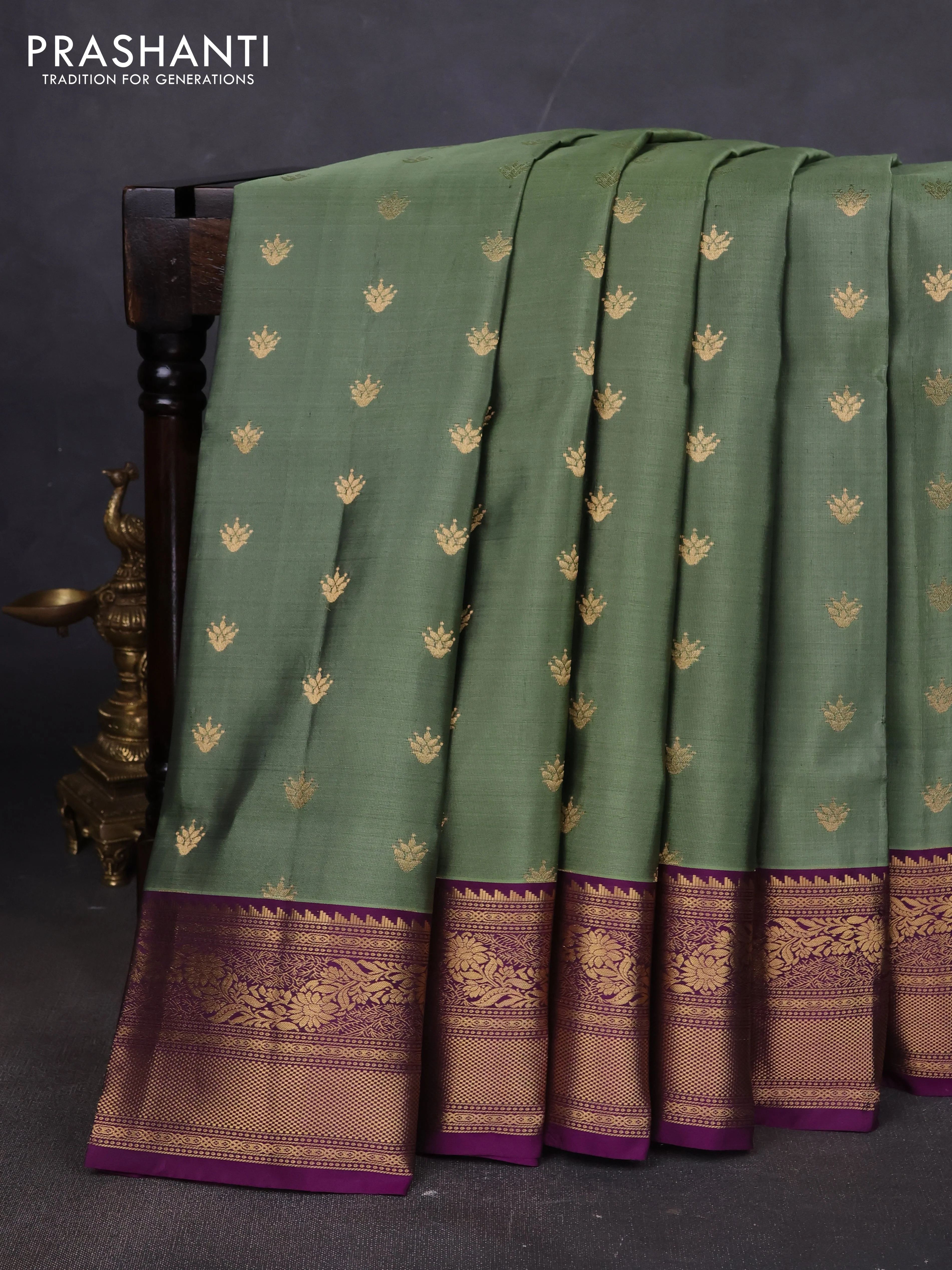 Pure soft silk saree pastel green and deep purple with allover zari woven buttas and rich zari woven border