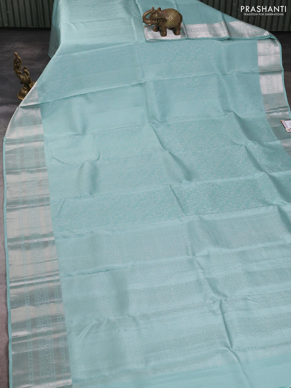 Pure soft silk saree pastel green with allover zari brocade weaves and zari woven border - Image 2