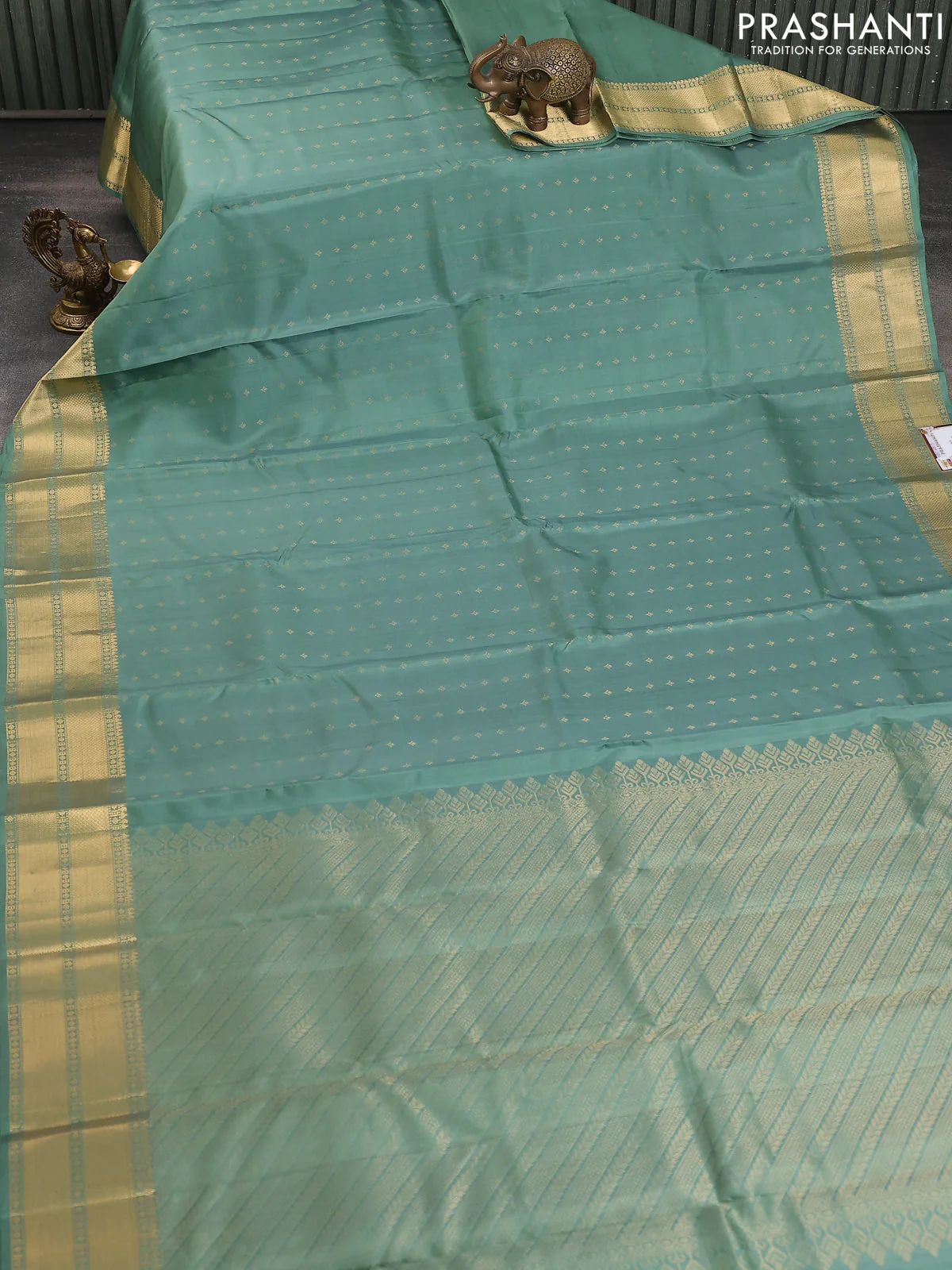Pure soft silk saree pastel green with allover zari woven buttas and zari woven border - Image 2