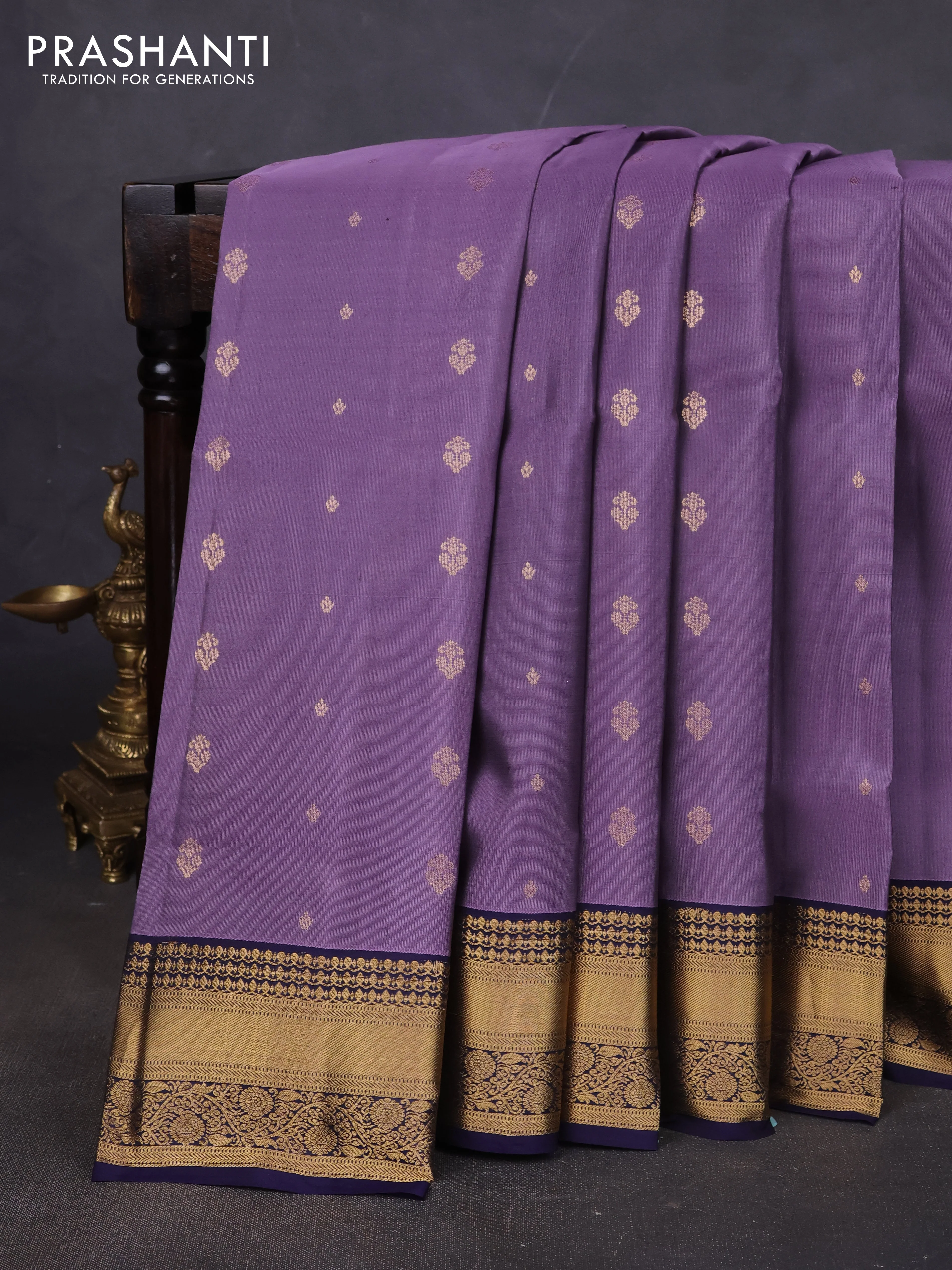 Pure soft silk saree pastel purple and navy blue with allover zari woven buttas and rich zari woven border