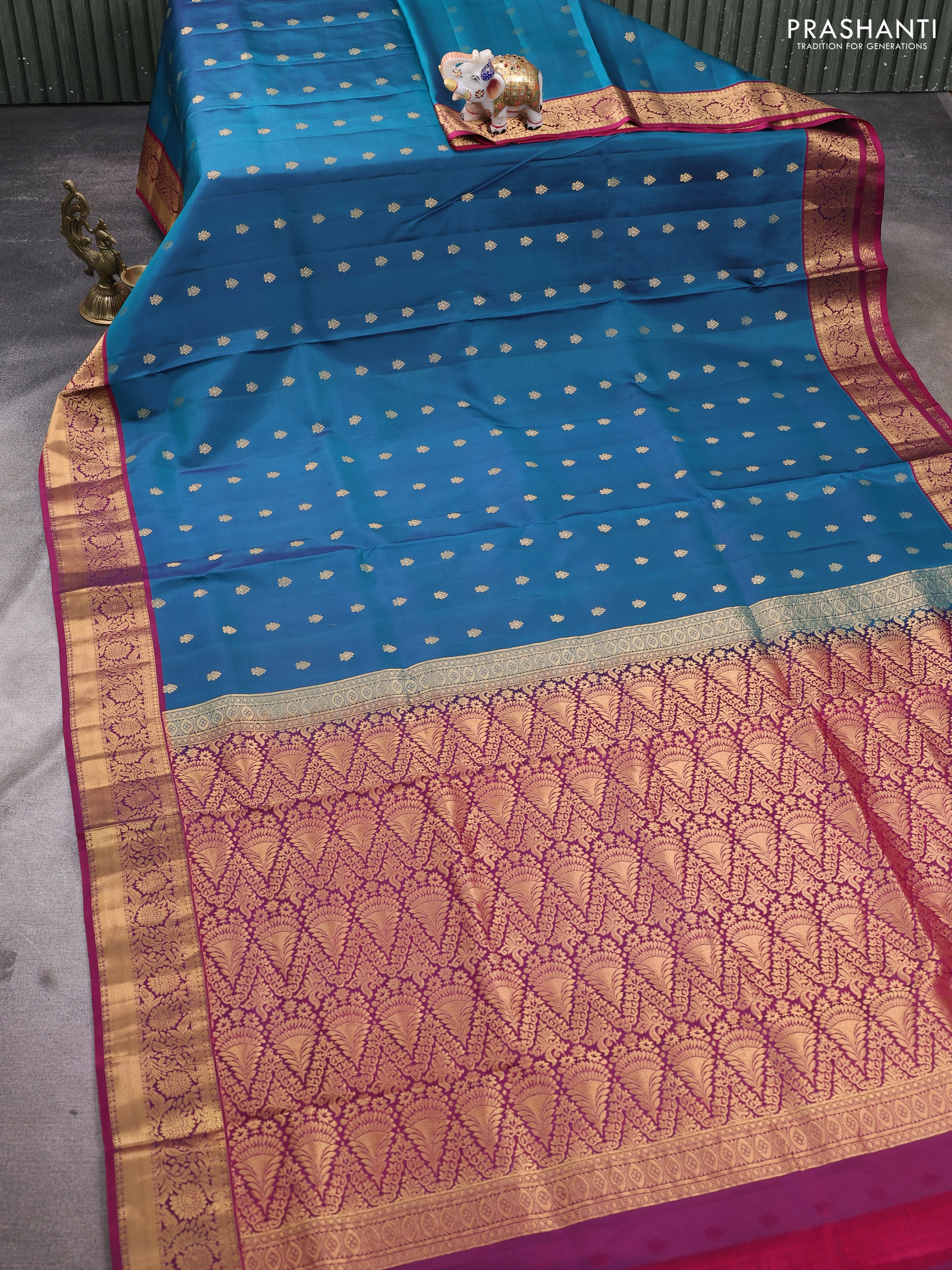 Pure soft silk saree peacock blue and dark magenta pink with allover zari woven buttas and floral zari woven border - Image 2
