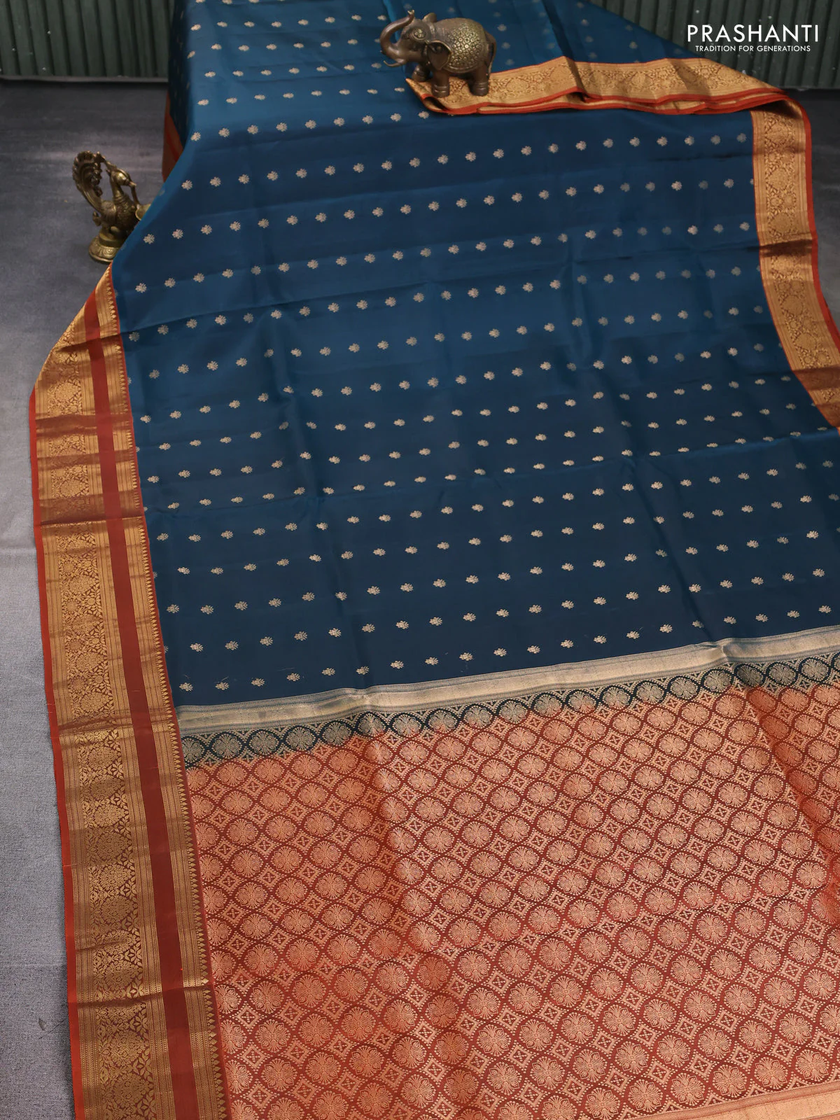 Pure soft silk saree peacock blue and rustic orange with allover zari woven buttas and zari woven border - Image 2