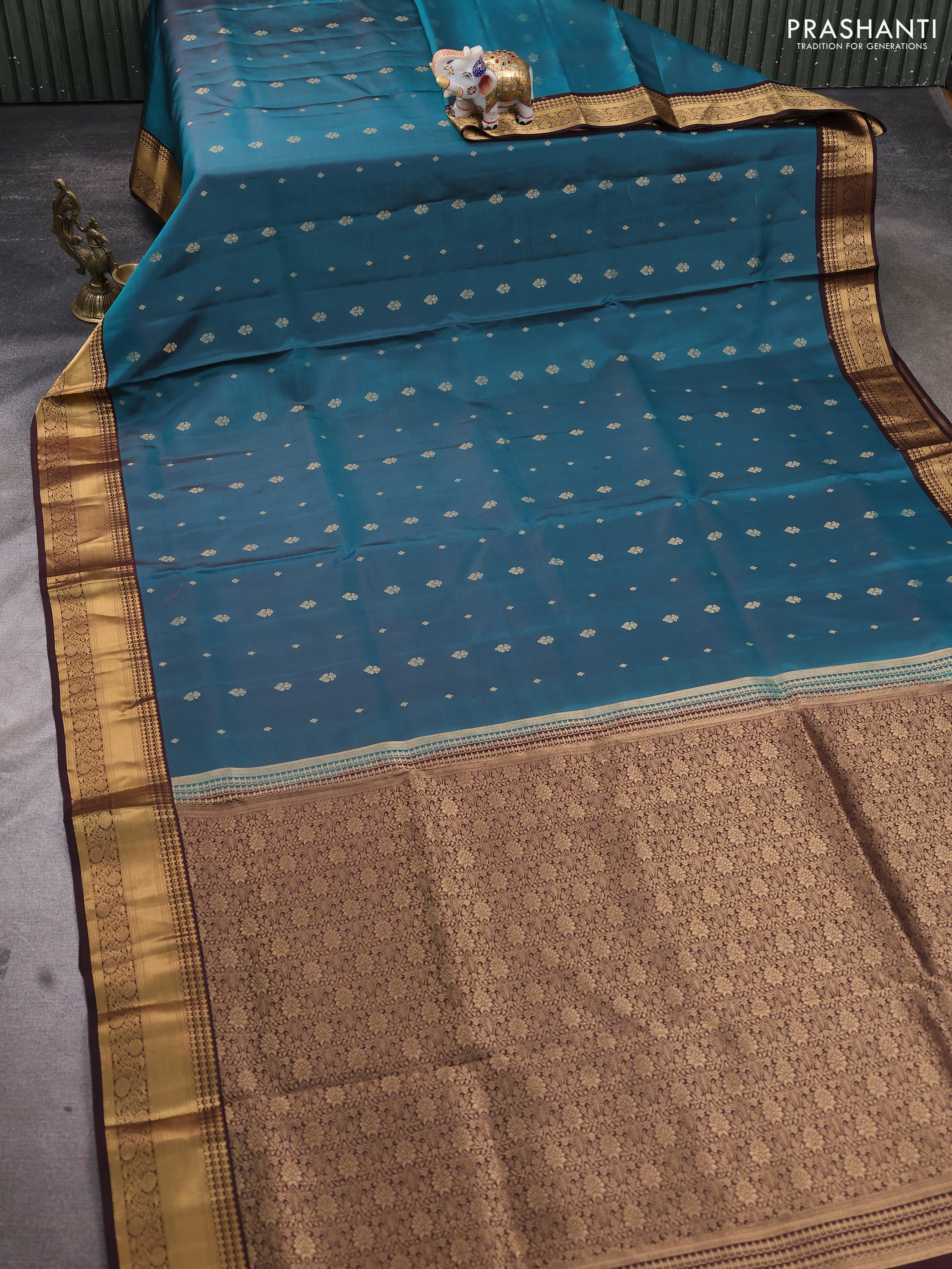 Pure soft silk saree peacock green and coffee brown with allover zari woven buttas and rich zari woven border - Image 2