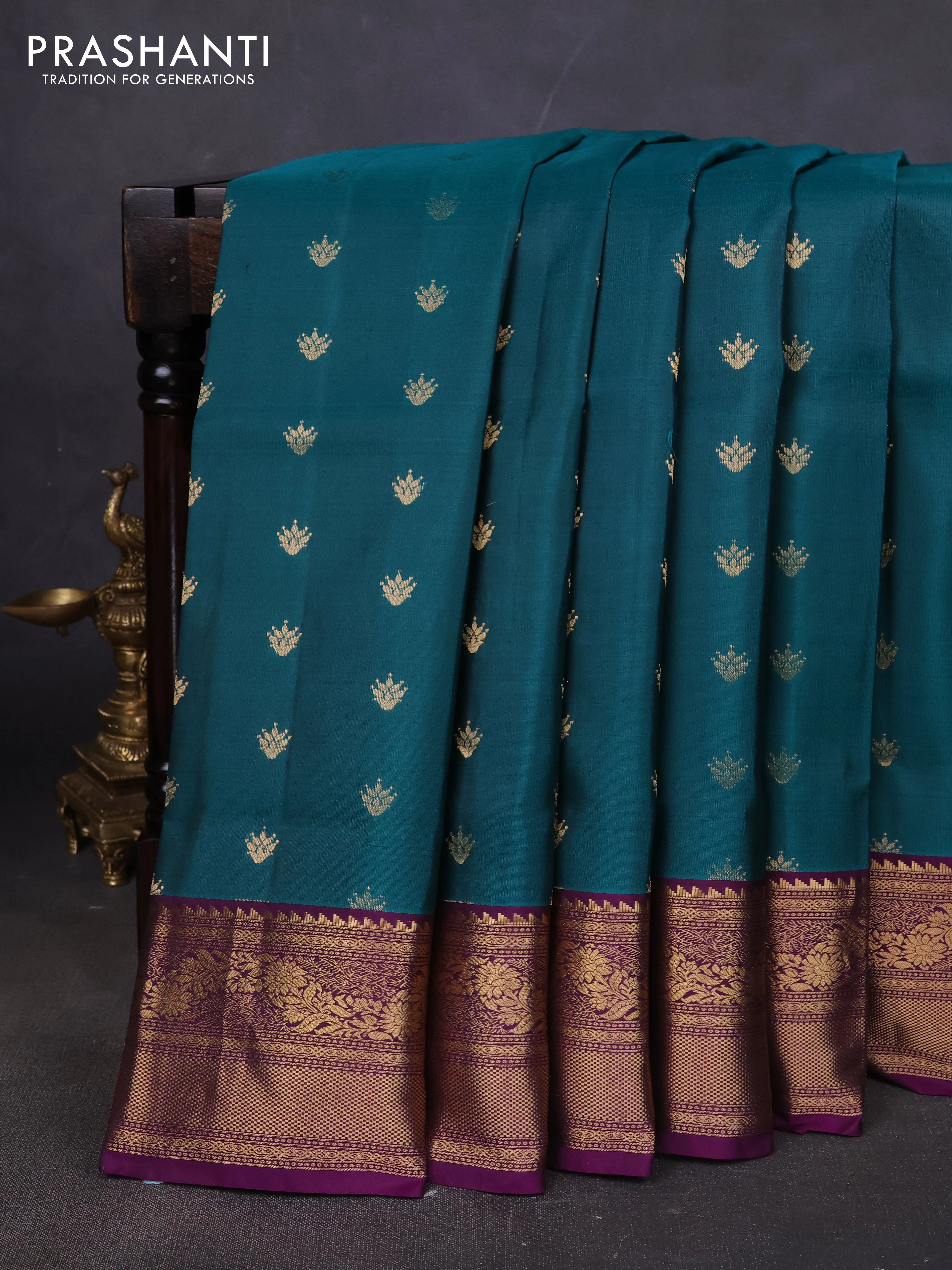 Pure soft silk saree peacock green and deep purple with allover zari woven buttas and rich zari woven border