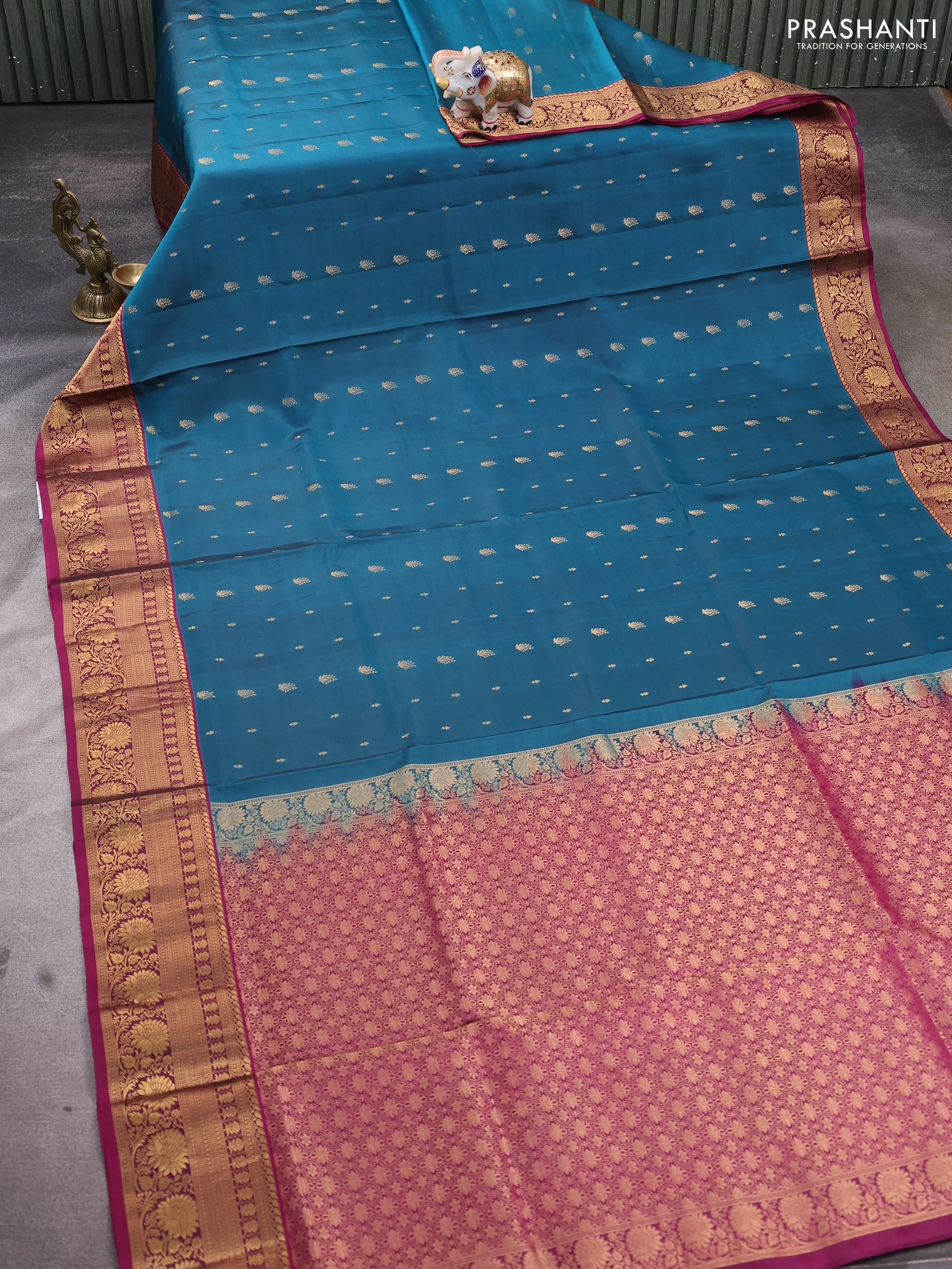 Pure soft silk saree peacock green and magenta pink with allover zari woven buttas and rich zari woven border - Image 2