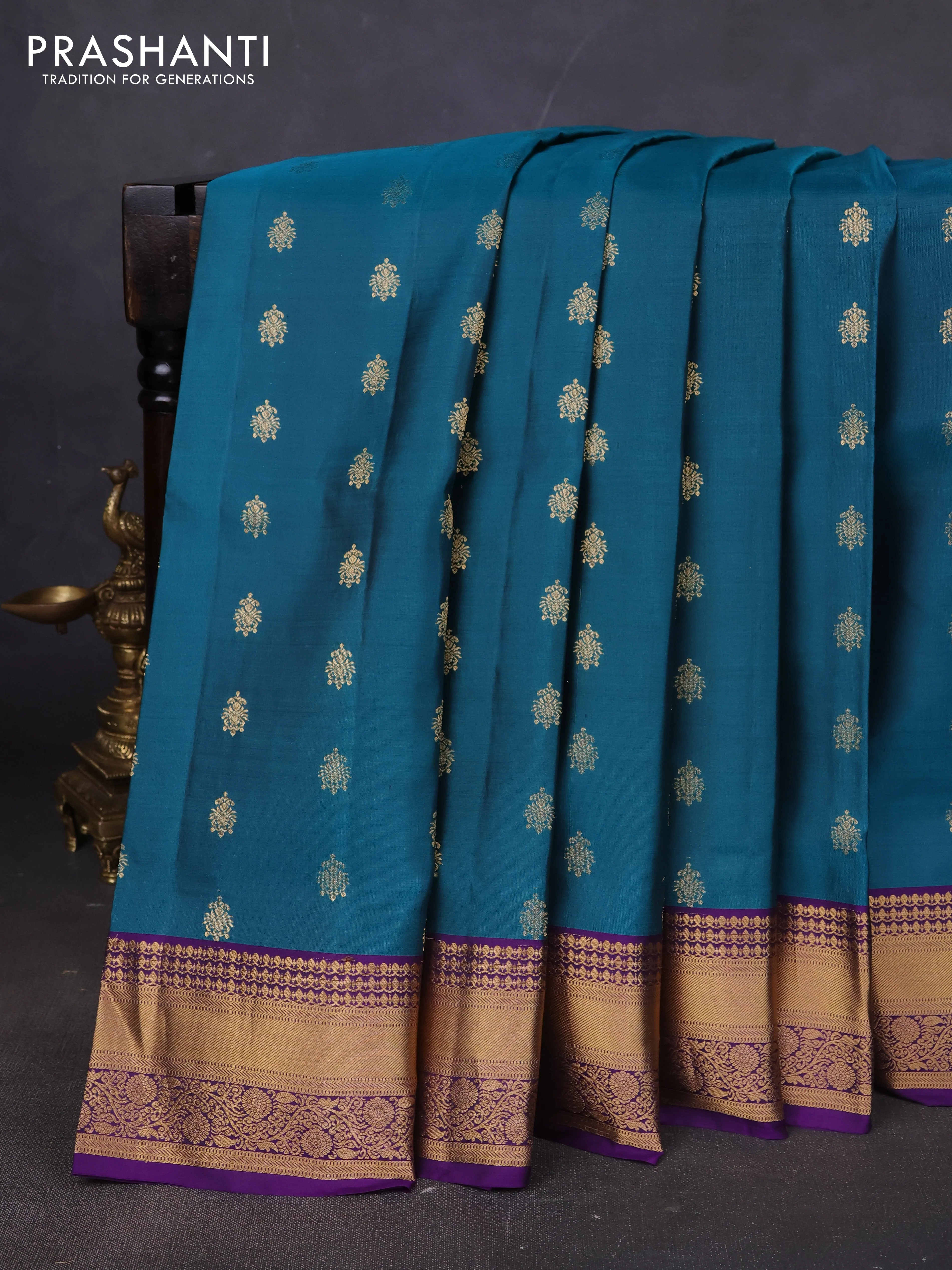 Pure soft silk saree peacock green and violet with allover zari woven buttas and rich zari woven border
