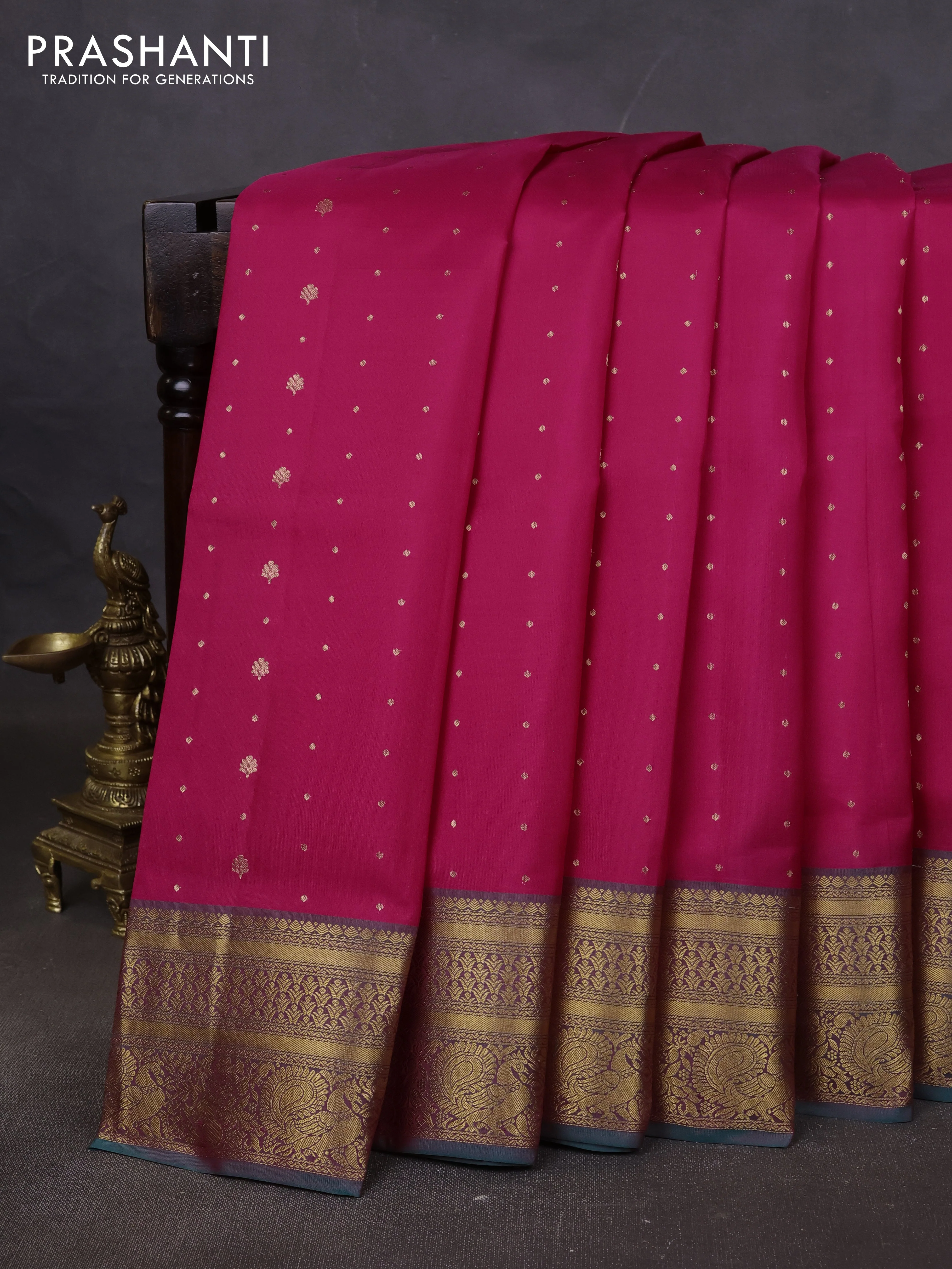 Pure soft silk saree pink and teal green with allover zari woven buttas and zari woven annam border