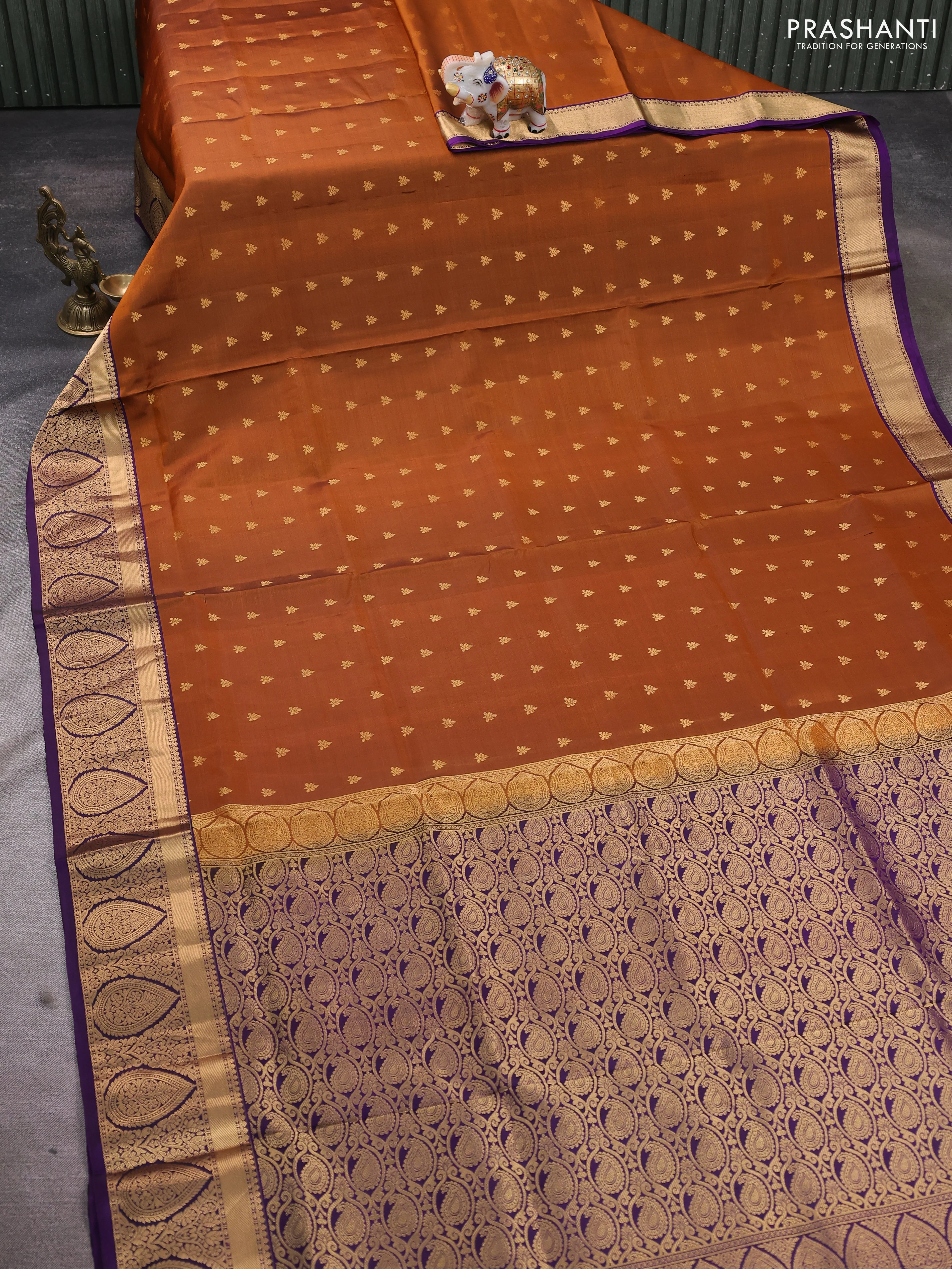 Pure soft silk saree rust shade and purple with allover zari woven buttas and rich zari woven border - Image 2