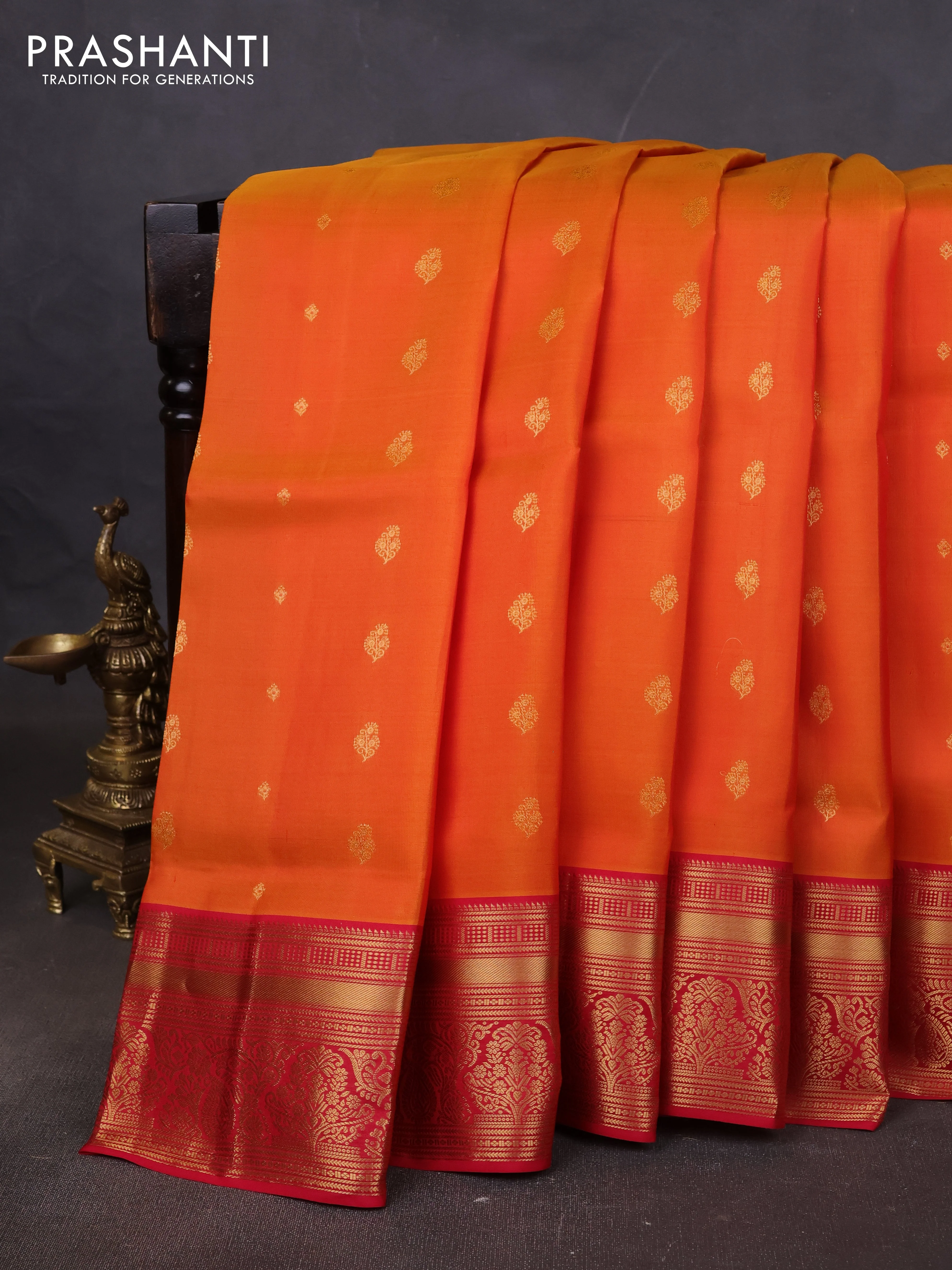 Pure soft silk saree sunset orange and pink with allover zari woven buttas and rich zari woven border
