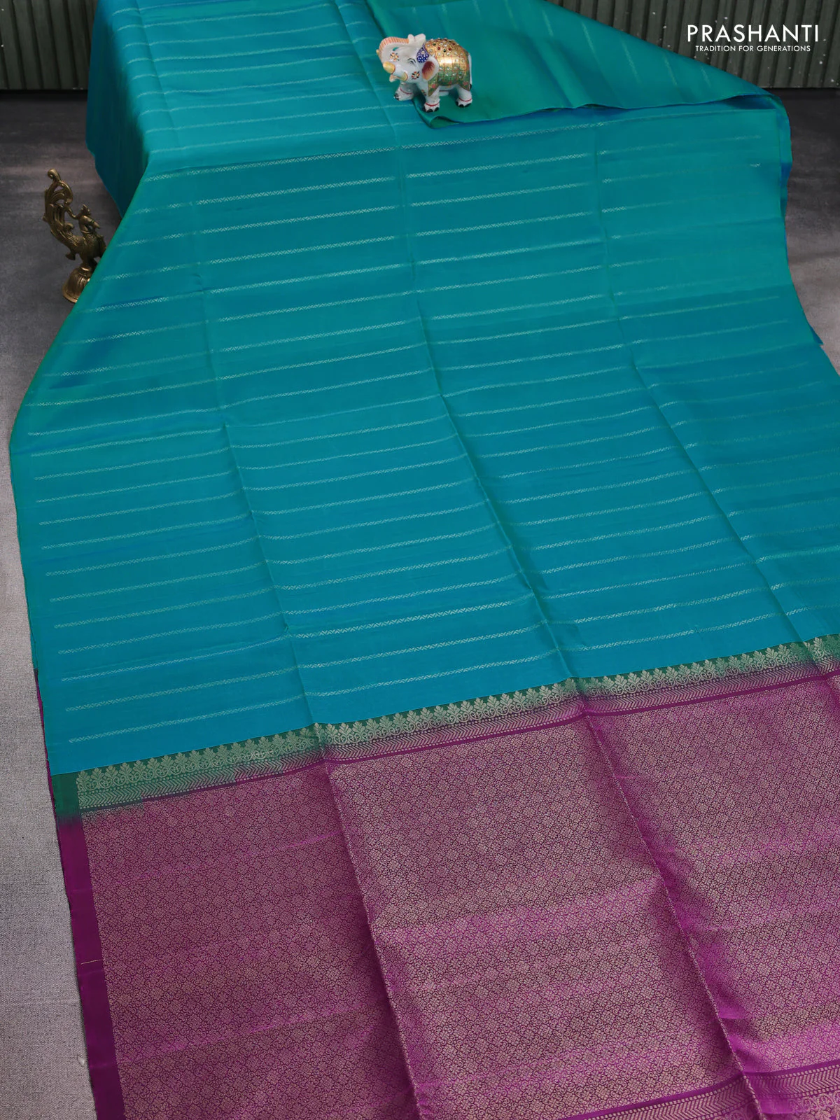 Pure soft silk saree teal blue and purple with allover zari stripes pattern in borderless style - Image 2
