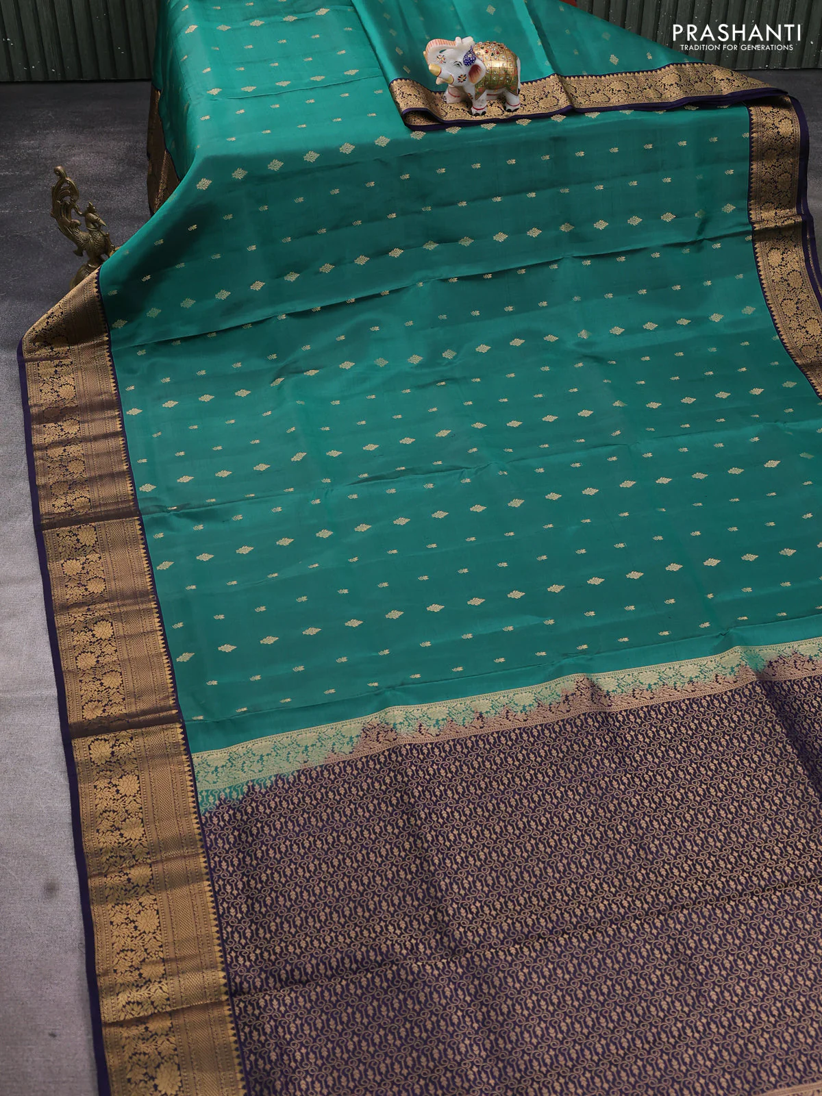 Pure soft silk saree teal green and navy blue with allover zari woven buttas and zari woven floral border - Image 2