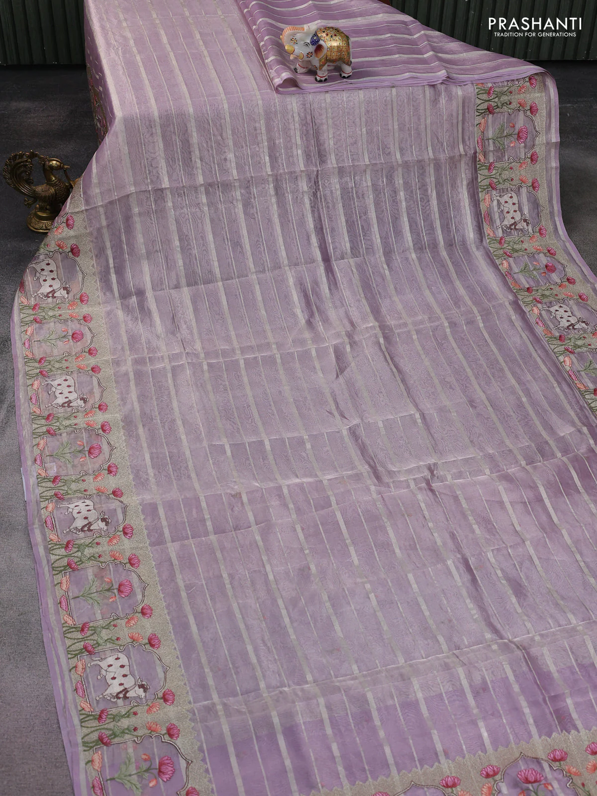 Pure tissue silk saree mild lavender with allover silver zari strip pattern & beaded work and pichwai embroidery border