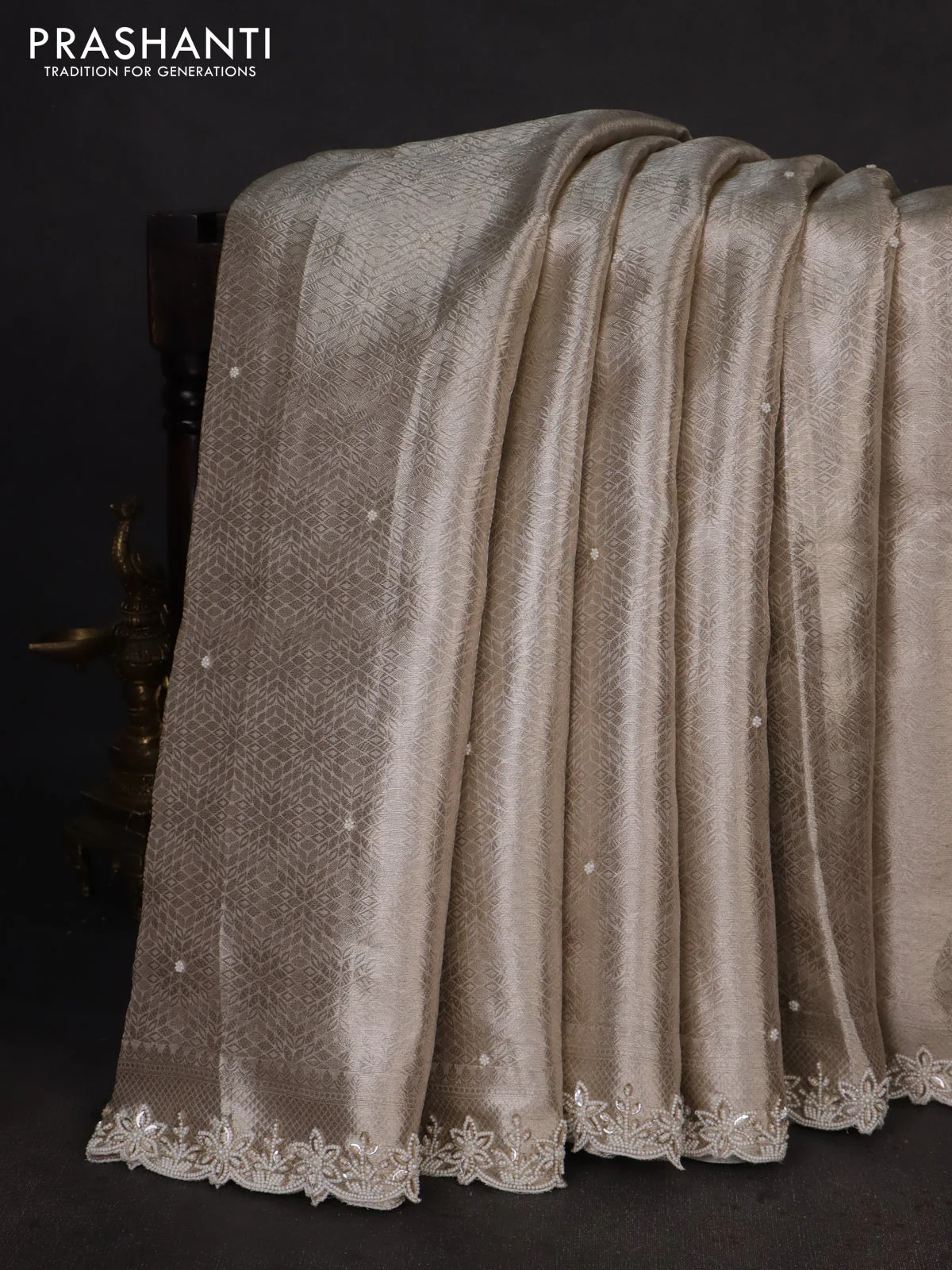 Pure tissue silk saree off white with allover zari woven brocade weaves & beaded work and beaded work border - Image 2