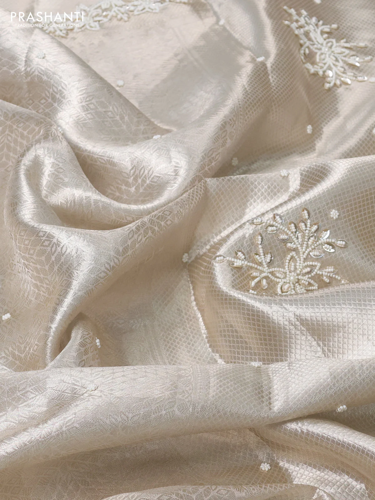 Pure tissue silk saree off white with allover zari woven brocade weaves & beaded work and beaded work border - Image 3