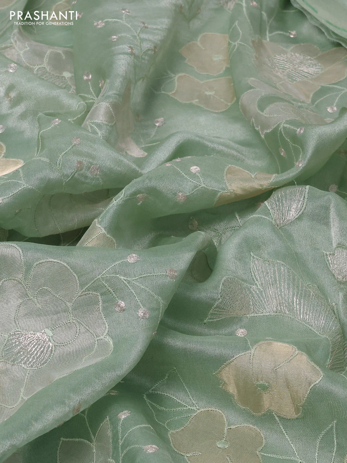 Pure tissue silk saree pastel green with allover floral embroidery work and simple embroidery border - Image 3