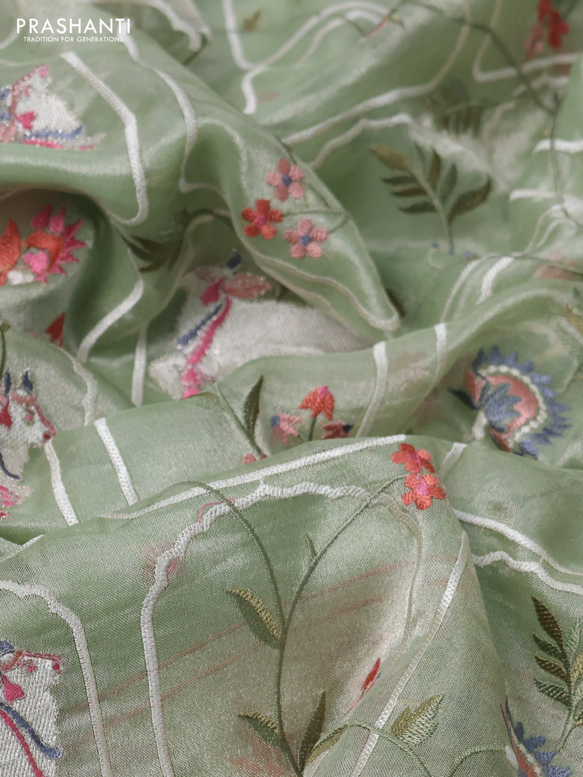 Pure tissue silk saree pastel green with allover pichwai embroidery work and embroidery border - Image 3