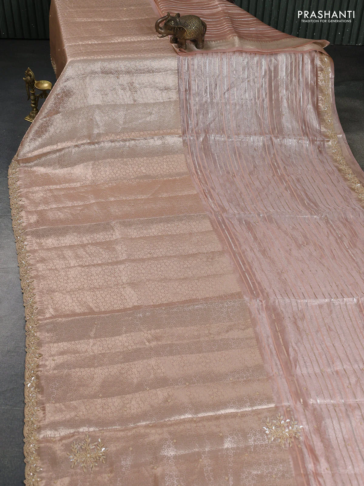 Pure tissue silk saree peach shade with Half & half style zari weaves and beaded work border